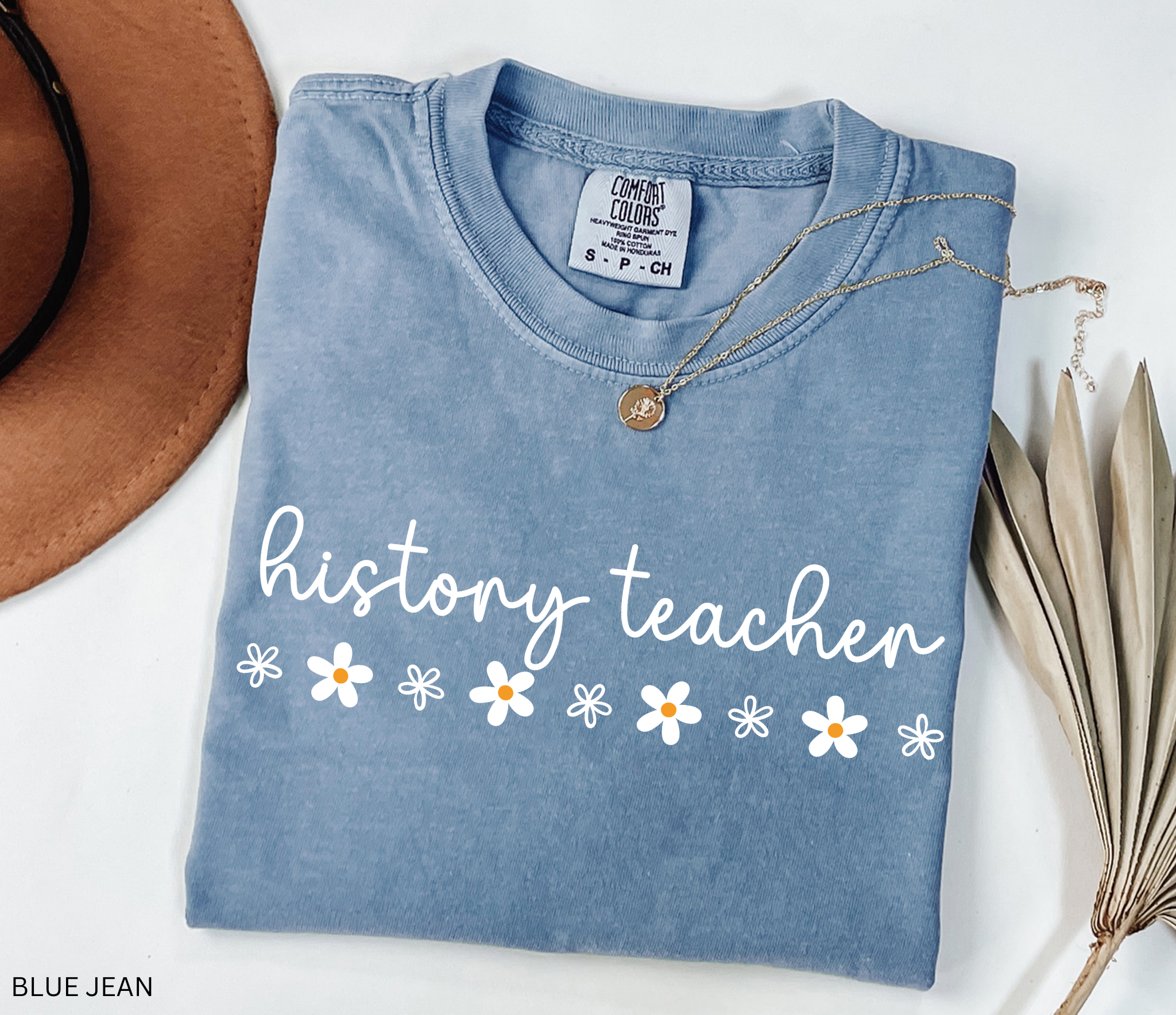 History teacher shirt with cursive text and daisy flower accents. Minimalist cute social studies teacher tee, perfect for classroom or teacher gift