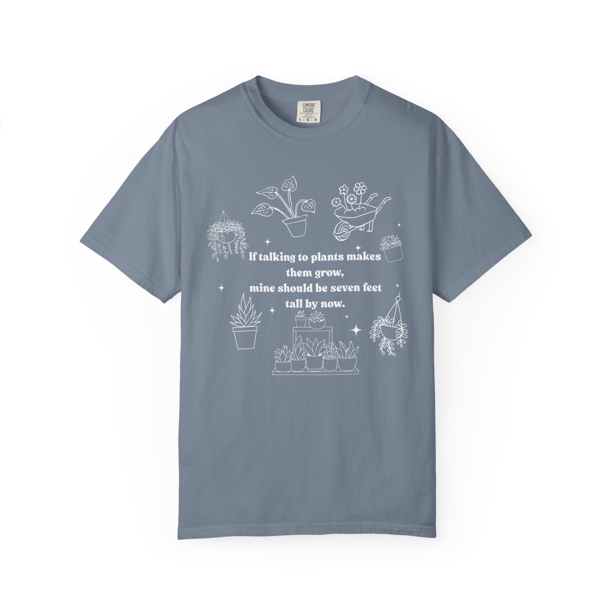 Funny plant lover shirt design with white line-art plants and text “If talking to plants makes them grow, mine should be seven feet tall by now.”