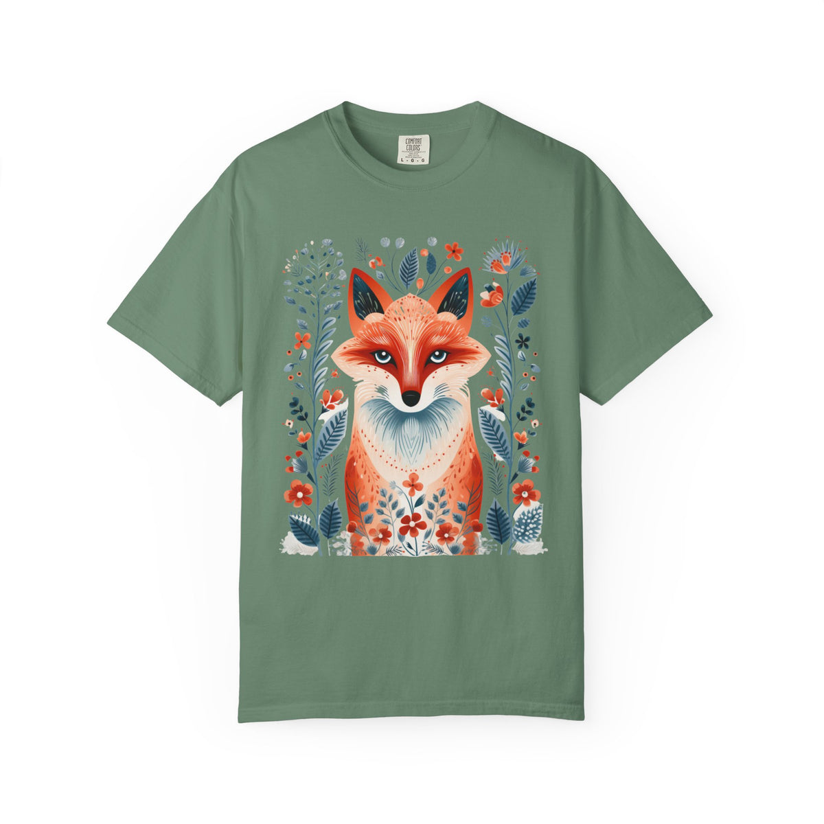 A sage green short-sleeve crewneck t-shirt featuring a detailed graphic print of a fox surrounded by colorful wildflowers, displayed on a clean white background.