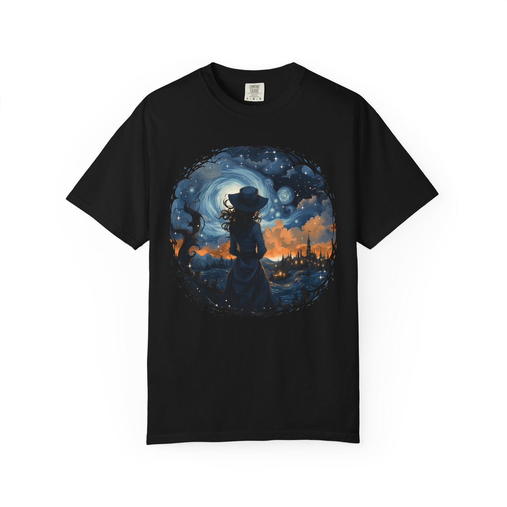 Celestial witch standing beneath swirling galaxy and glowing town – witchcore aesthetic shirt design