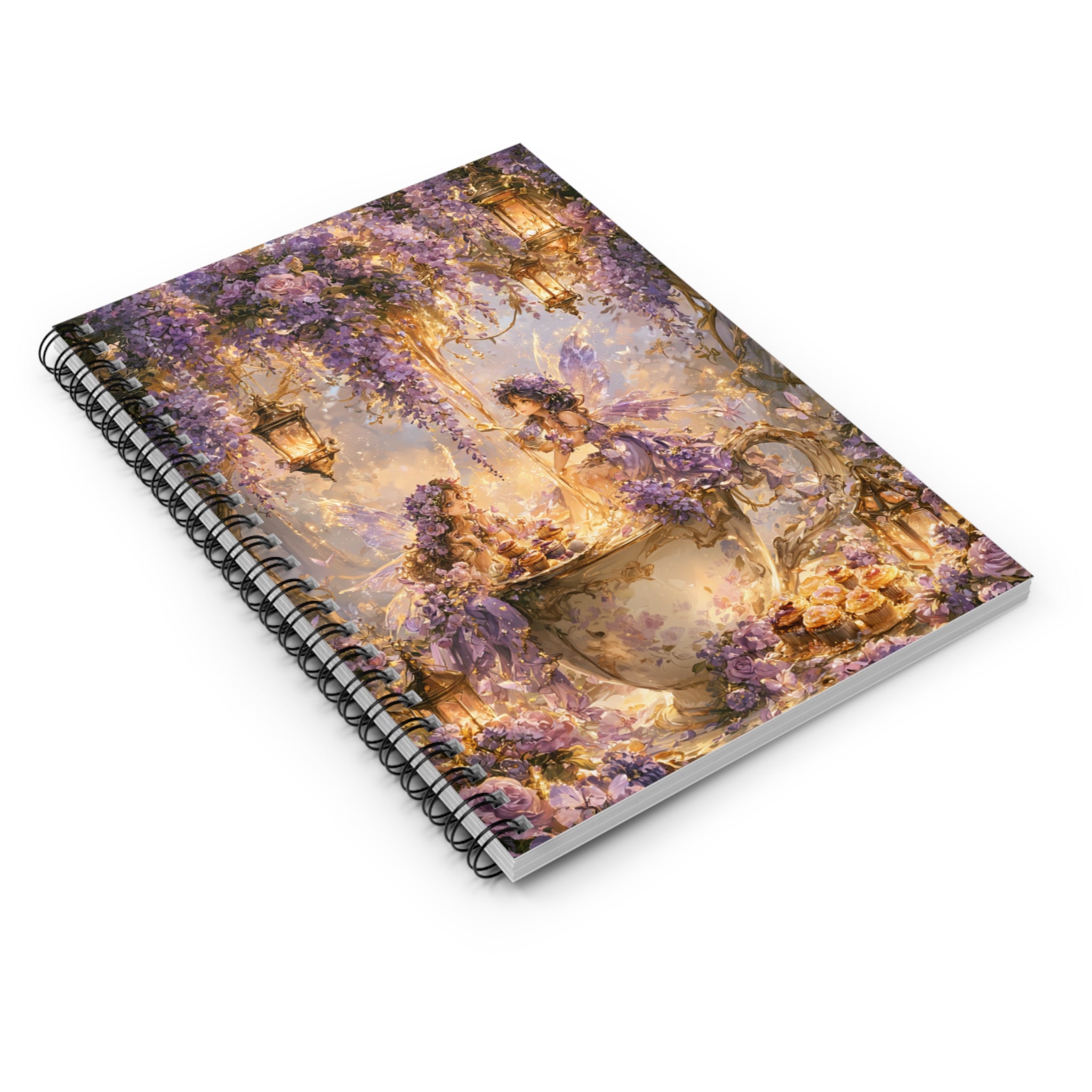 Spiral-bound journal featuring two fairies sharing tea inside an ornate floral teacup beneath cascading purple wisteria blossoms and glowing lanterns in a whimsical fairy garden setting.