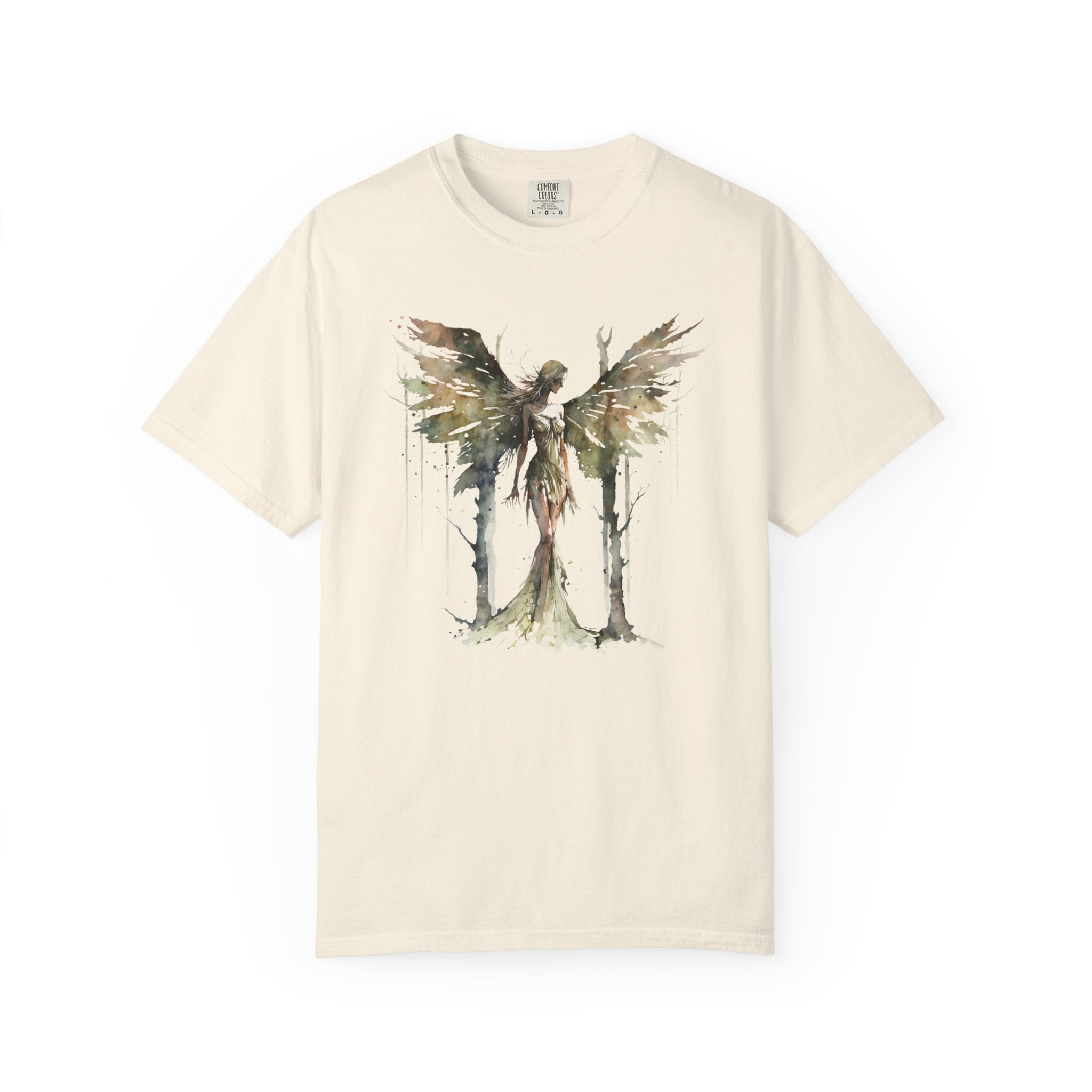 An off-white short-sleeve crewneck t-shirt featuring a watercolor-style graphic of a winged angel figure standing among trees on the front.