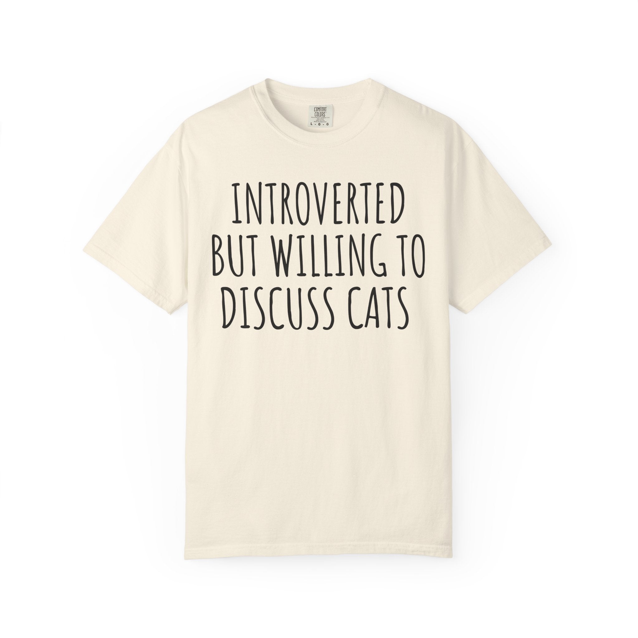 Funny Comfort Colors cat lover shirt featuring the phrase "Introverted But Willing to Discuss Cats," designed for introverts, cat moms, cat dads, and pet lovers.