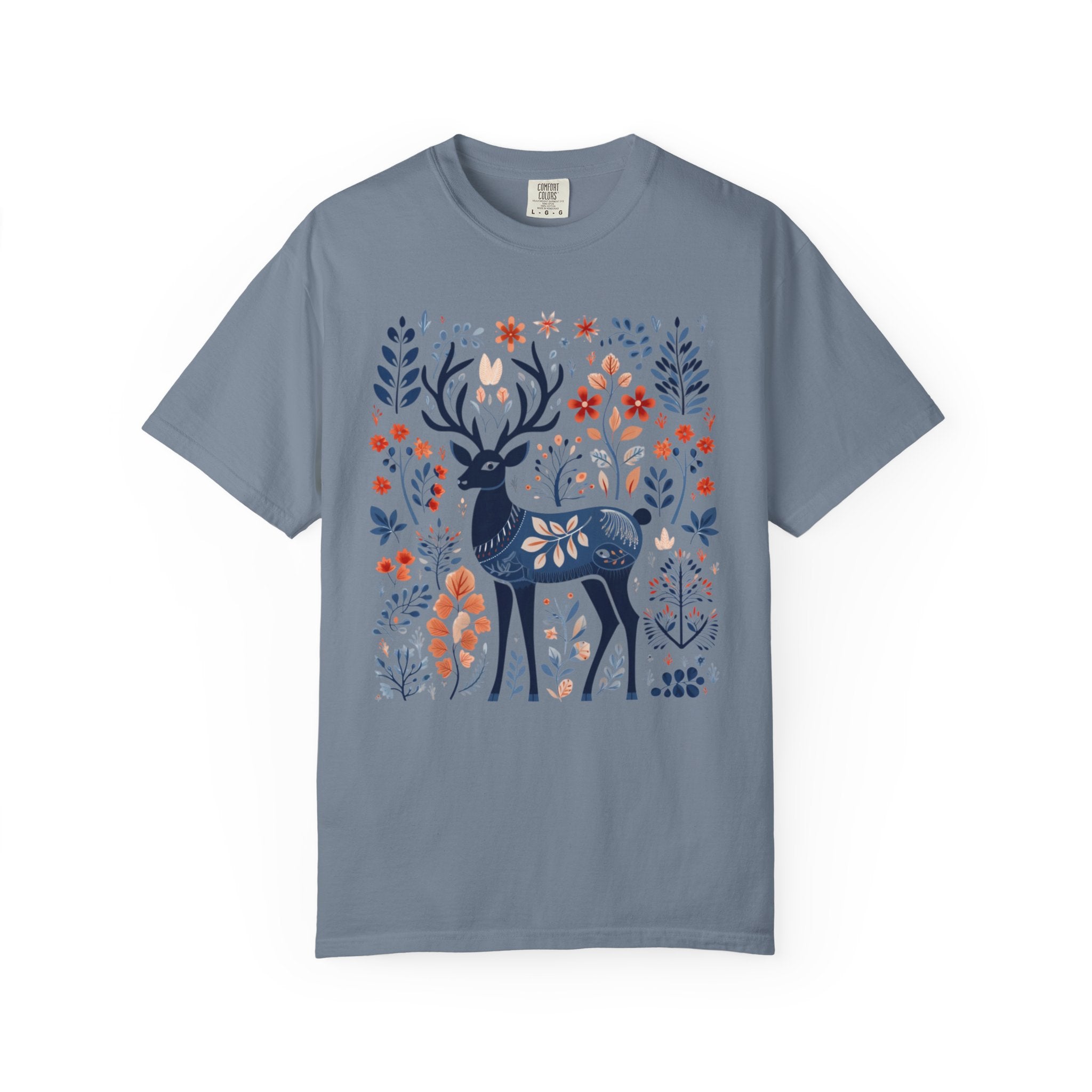 Nordic folk art deer surrounded by woodland leaves and flowers on a cottagecore forest shirt