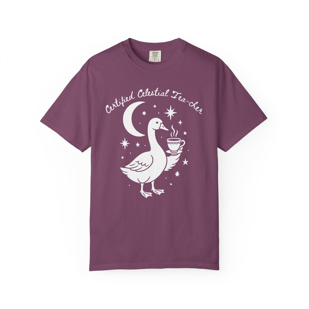 Certified Celestial Tea-cher Comfort Colors t-shirt featuring a whimsical goose holding a steaming teacup beneath a crescent moon and stars, perfect for witchy teachers, tea lovers, and cottagecore fashion.