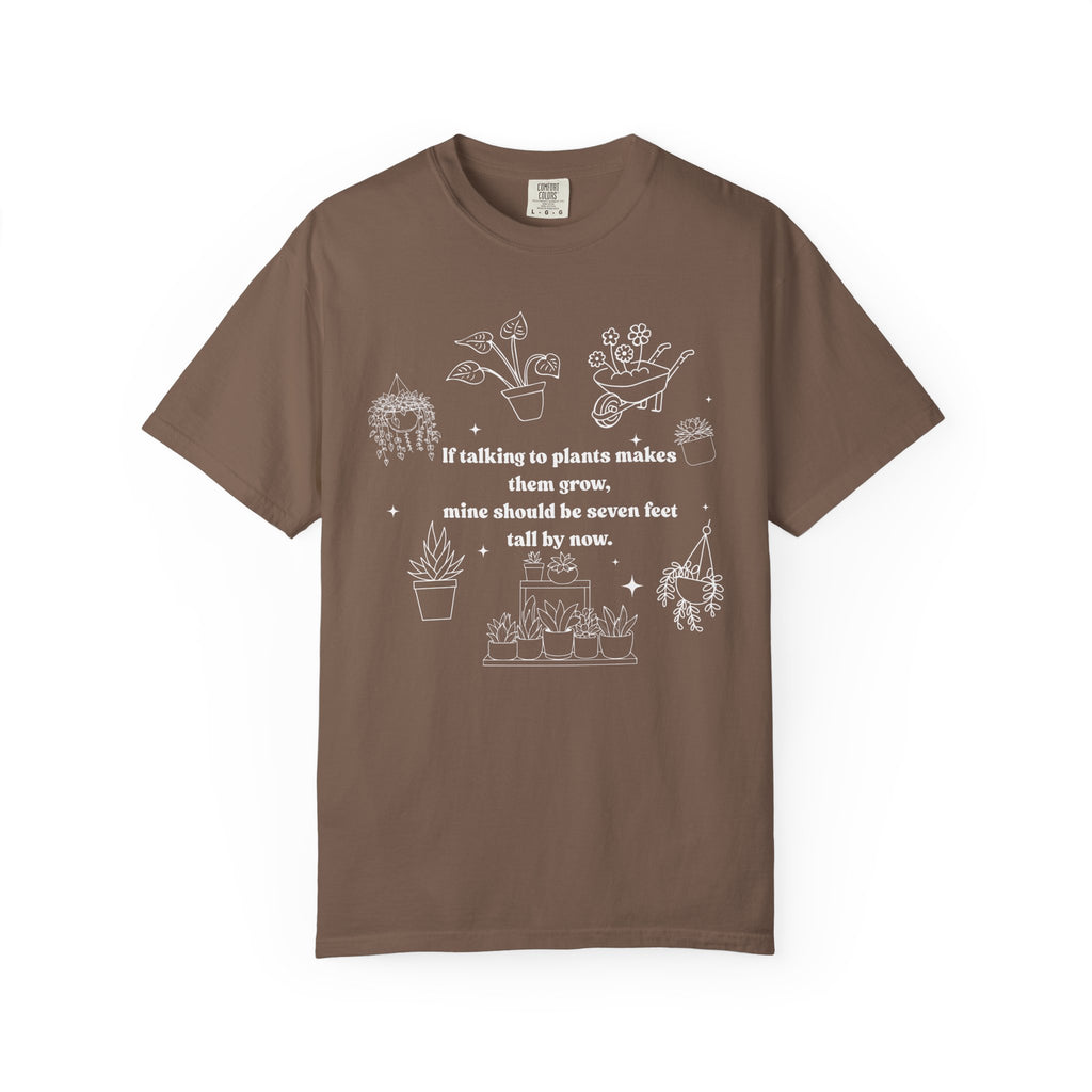 Funny plant lover shirt design with white line-art plants and text “If talking to plants makes them grow, mine should be seven feet tall by now.”