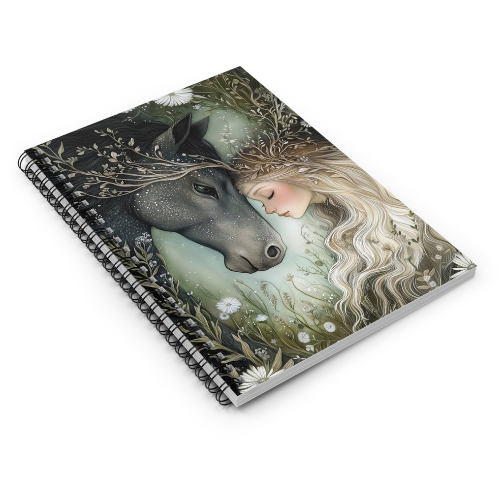 Notebook with an illustration of a woman and a horse on the cover