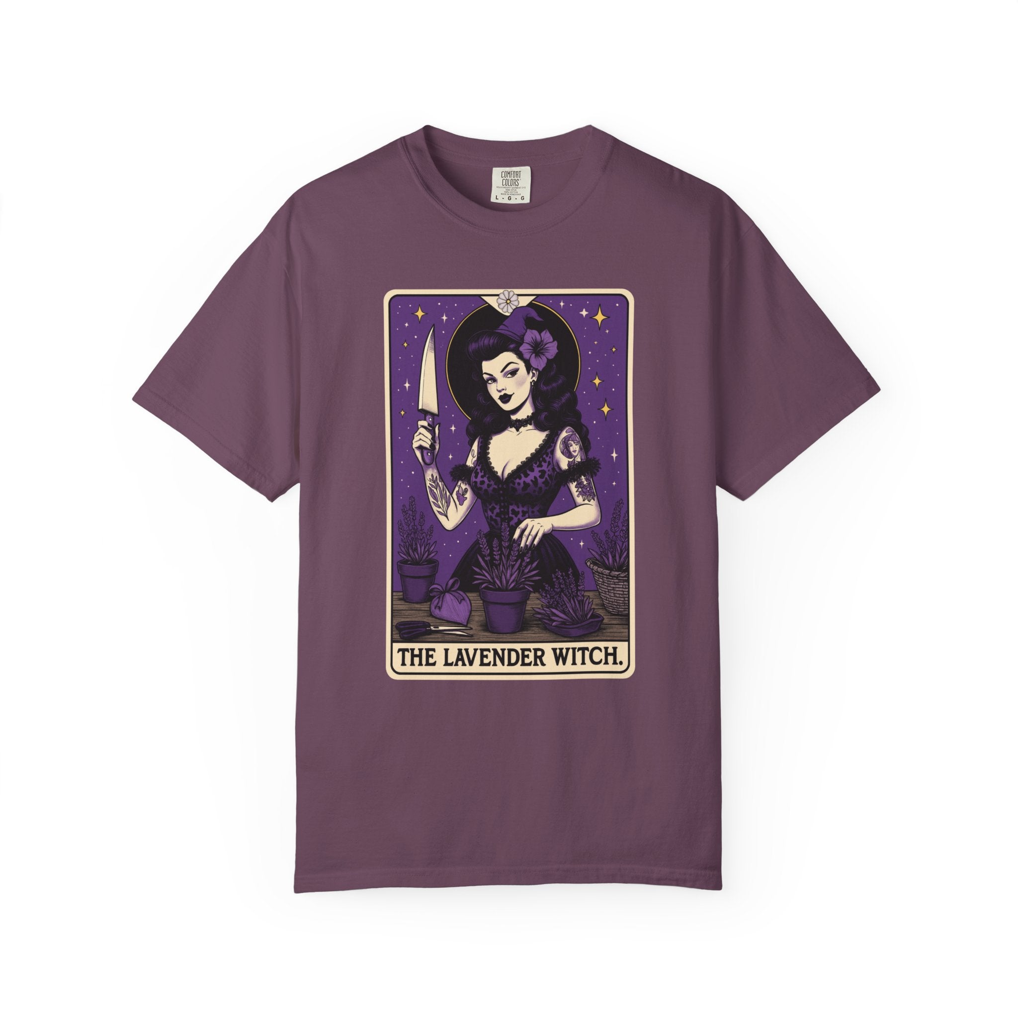 Vintage tarot-style witch shirt featuring a woman tending lavender plants with a knife and flower hat, surrounded by stars.