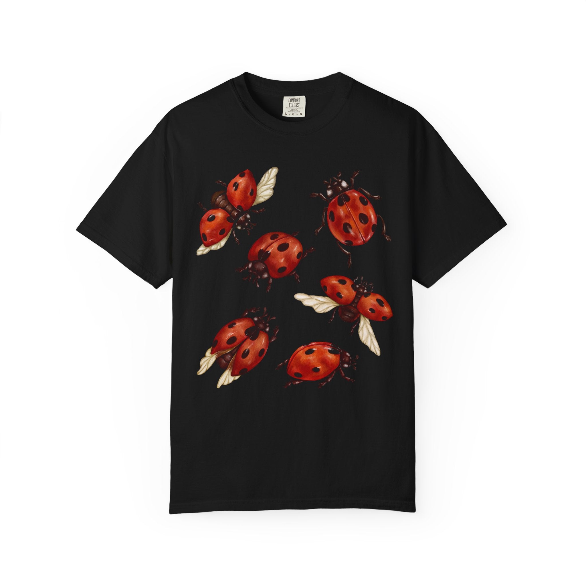 Watercolor red ladybugs design printed on a vintage-style Comfort Colors cottagecore shirt