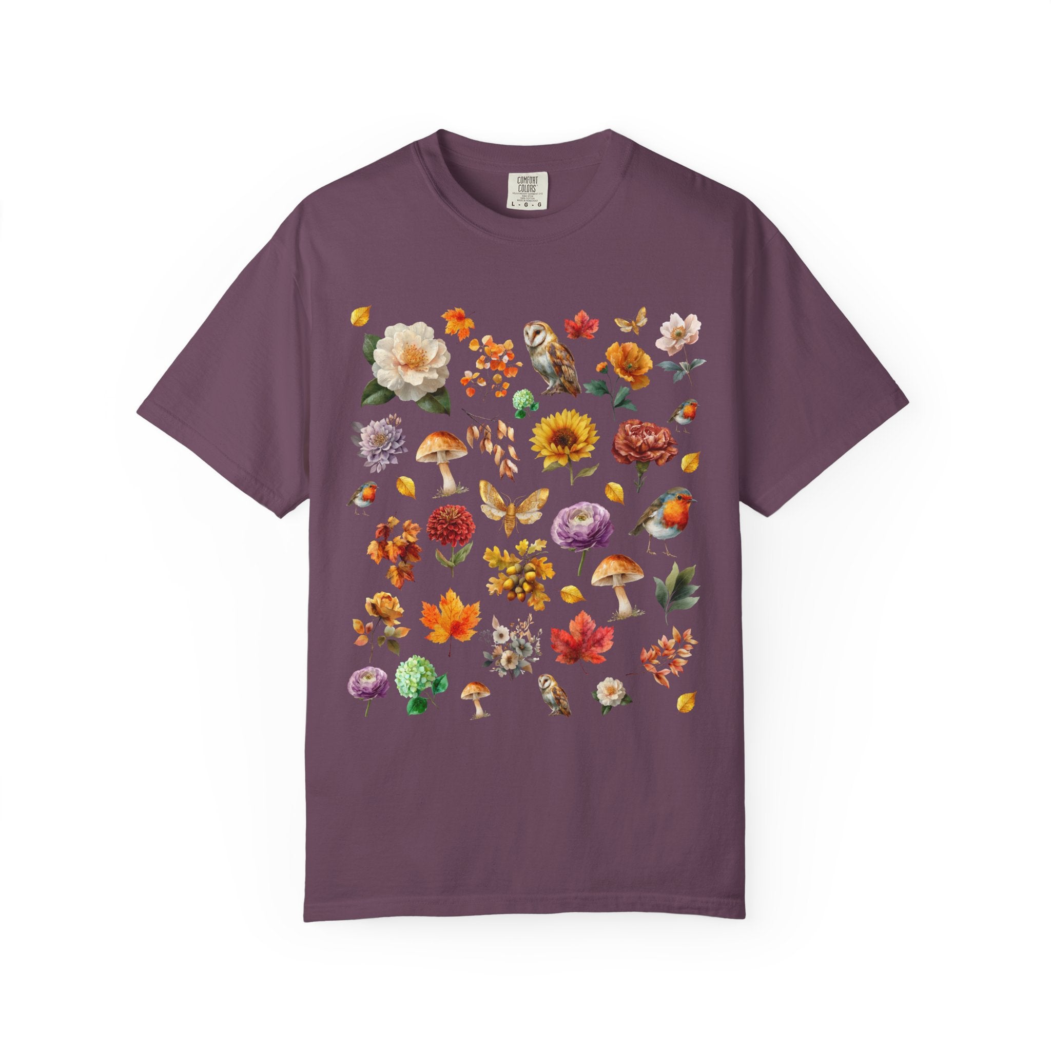 Watercolor woodland collage design featuring owls, robins, mushrooms, butterflies, fall leaves, and florals on an autumn cottagecore shirt.