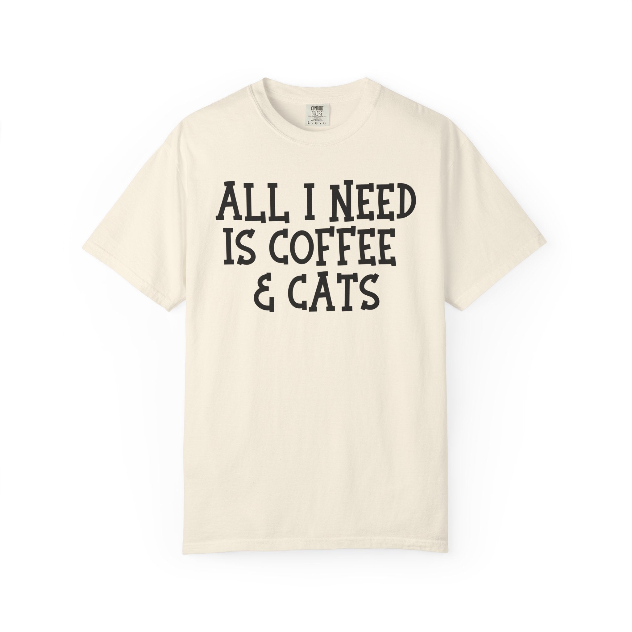Comfort Colors graphic t-shirt featuring the phrase "All I Need Is Coffee & Cats" in bold vintage lettering, perfect for coffee lovers, cat moms, and animal lovers.