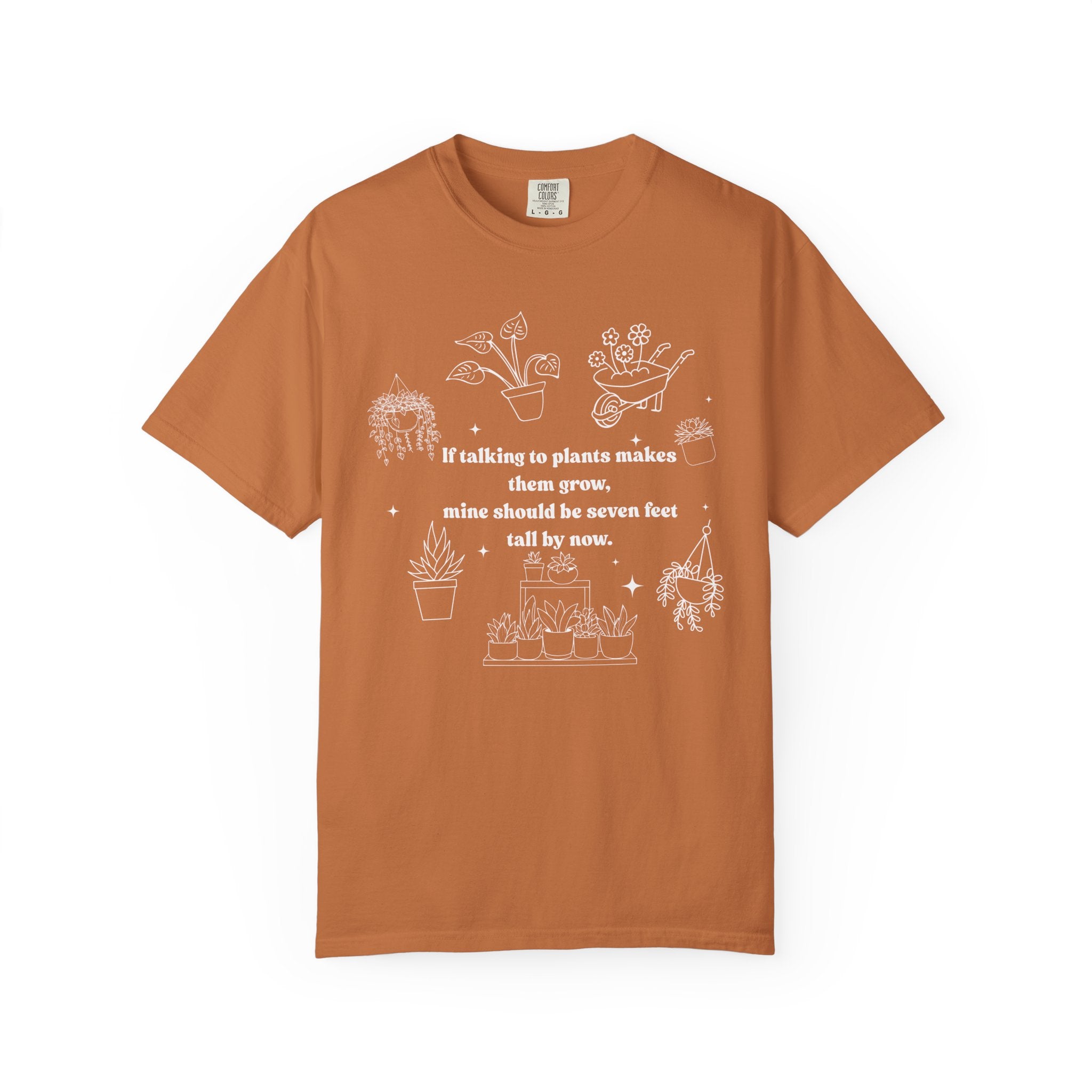 Funny plant lover shirt design with white line-art plants and text “If talking to plants makes them grow, mine should be seven feet tall by now.”
