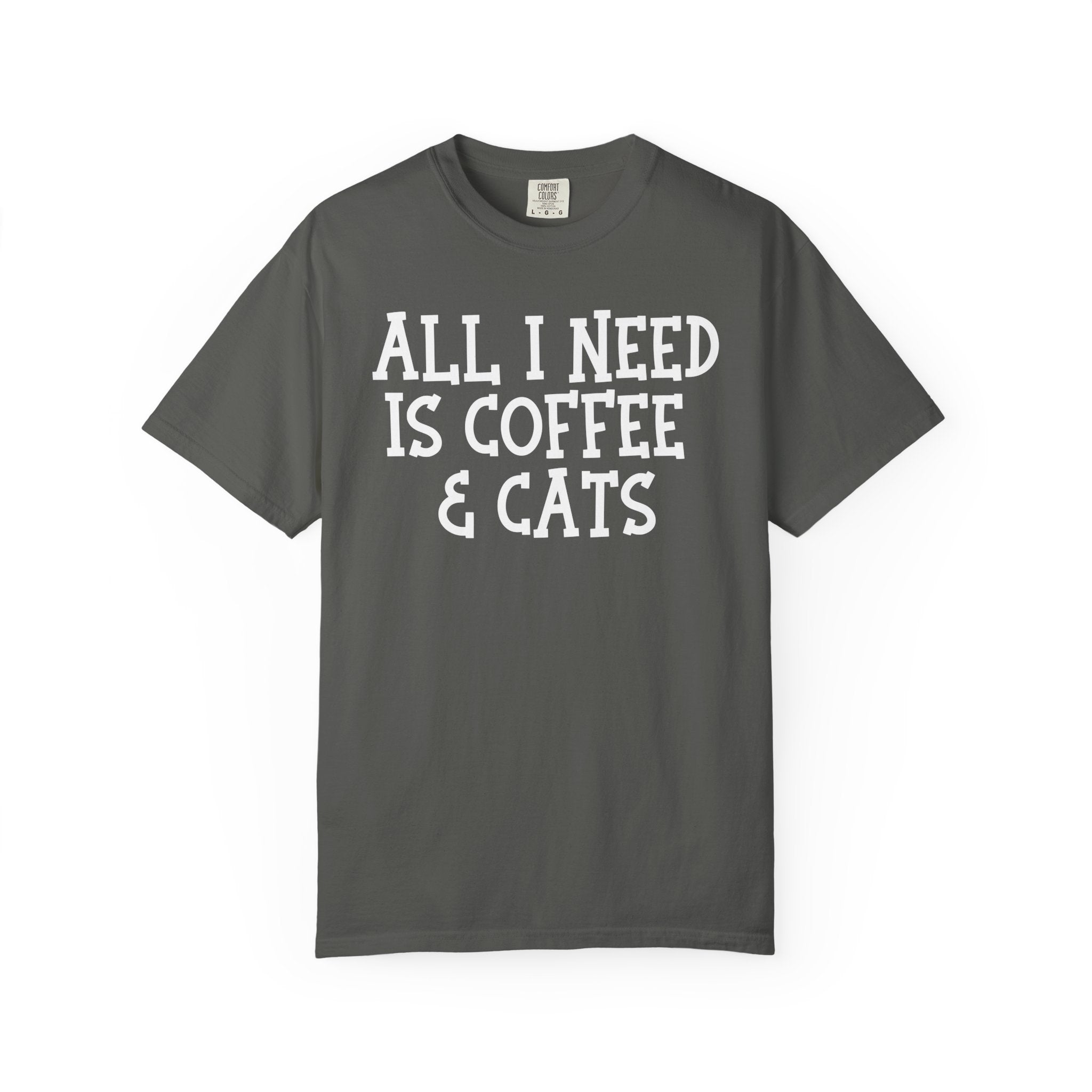 Comfort Colors graphic t-shirt featuring the phrase "All I Need Is Coffee & Cats" in bold vintage lettering, perfect for coffee lovers, cat moms, and animal lovers.