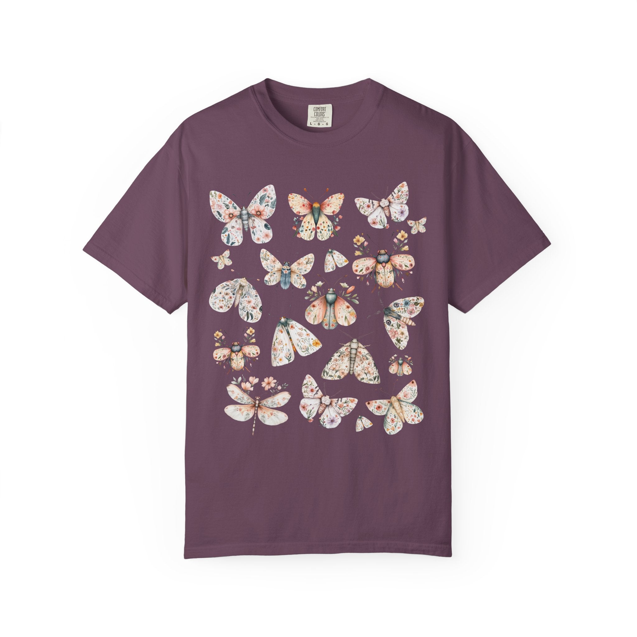 Cottagecore floral moth and butterfly shirt design with pastel flowers on delicate wings.