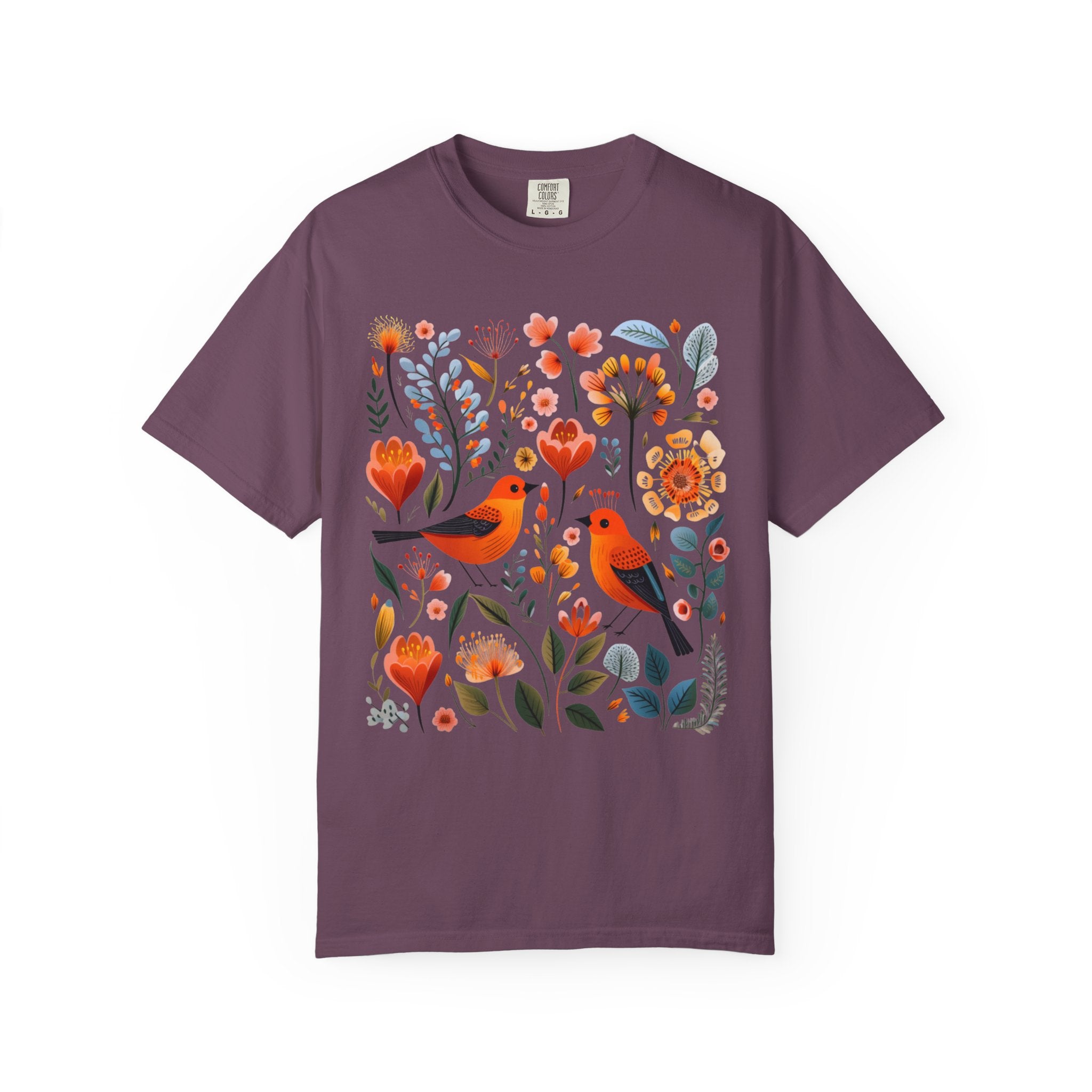 Scandinavian folk art design with two orange songbirds surrounded by blue and orange flowers in a Nordic floral pattern.