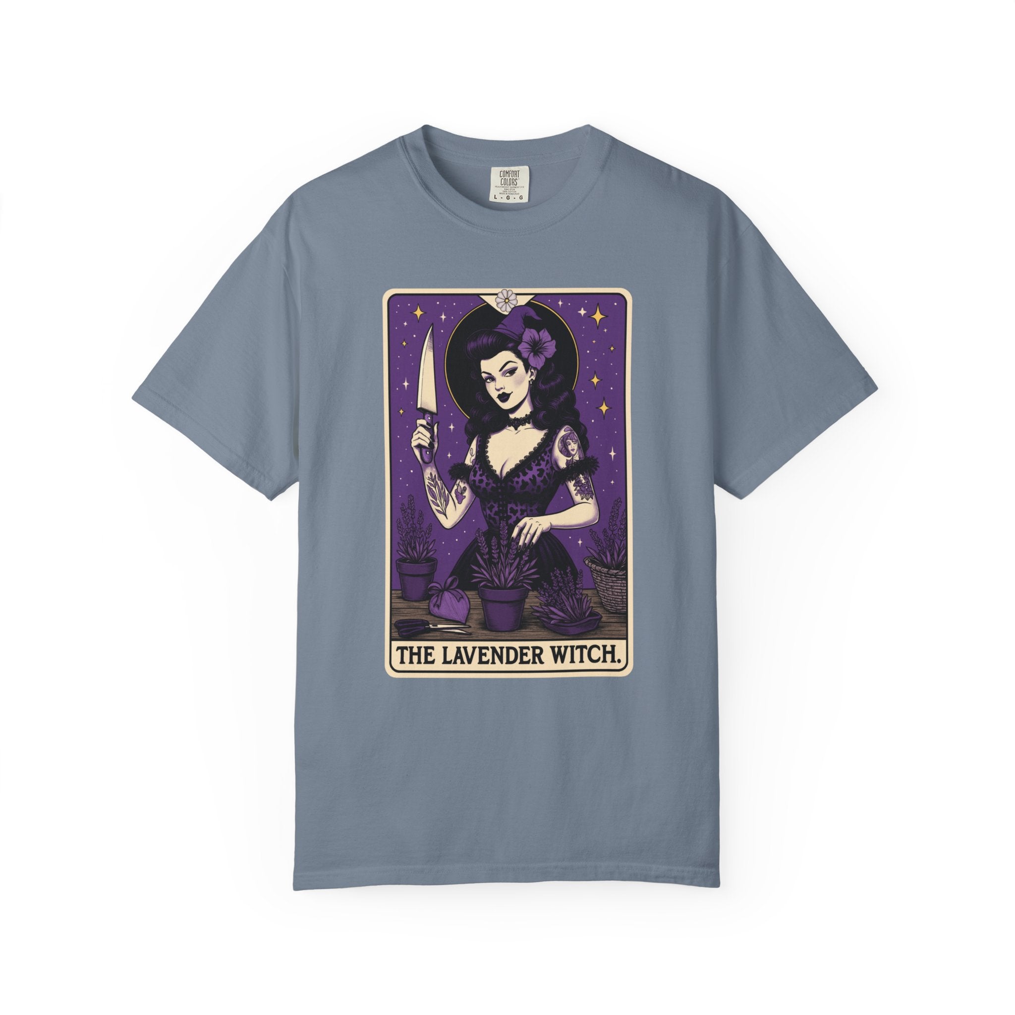 Vintage tarot-style witch shirt featuring a woman tending lavender plants with a knife and flower hat, surrounded by stars.
