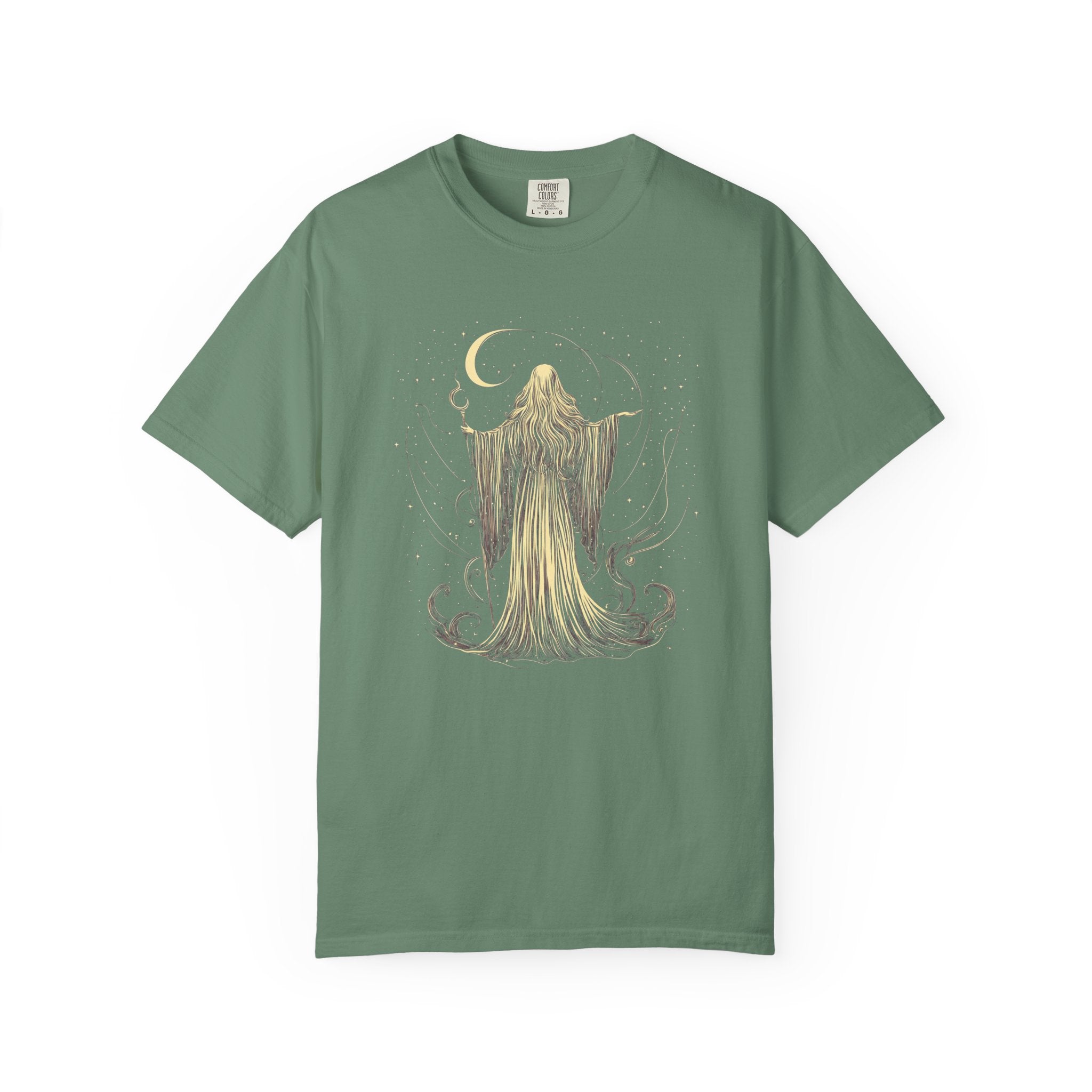 Vintage Comfort Colors t-shirt featuring an elegant moon priestess standing beneath a crescent moon surrounded by stars and flowing celestial magic. Available in Blue Jean, Espresso, Pepper, and Black.