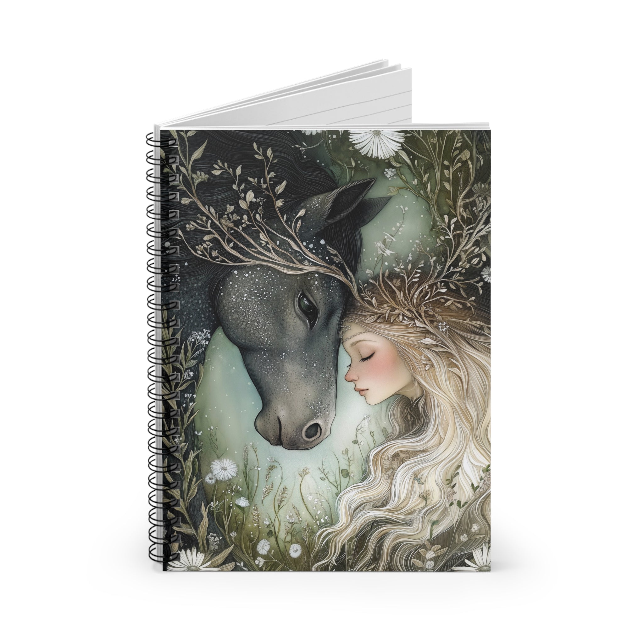 Notebook with a design of a woman and a deer on the cover, surrounded by nature.