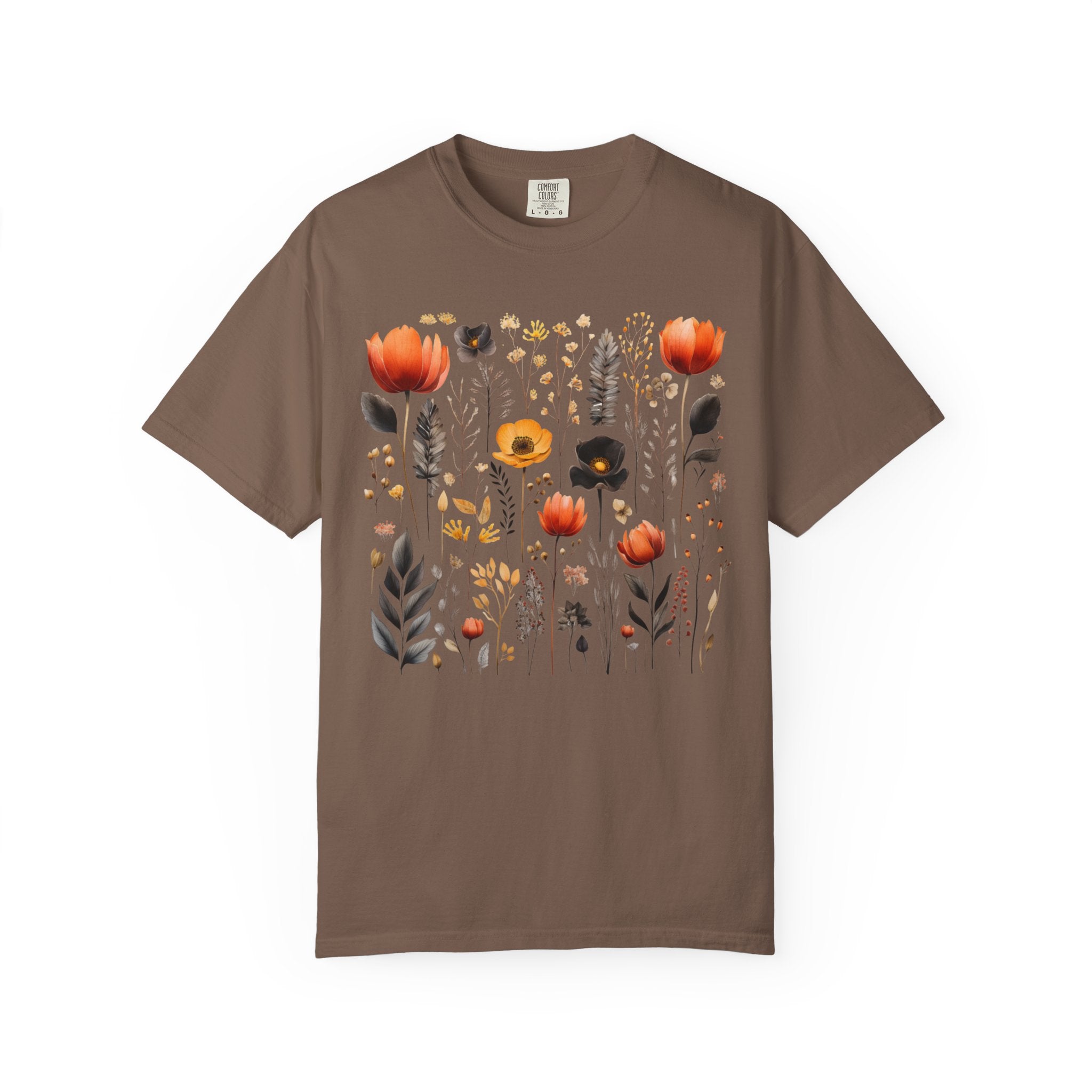 Comfort Colors Pepper shirt featuring a Nordic wildflower botanical design with orange, yellow, and charcoal florals in a cottagecore style