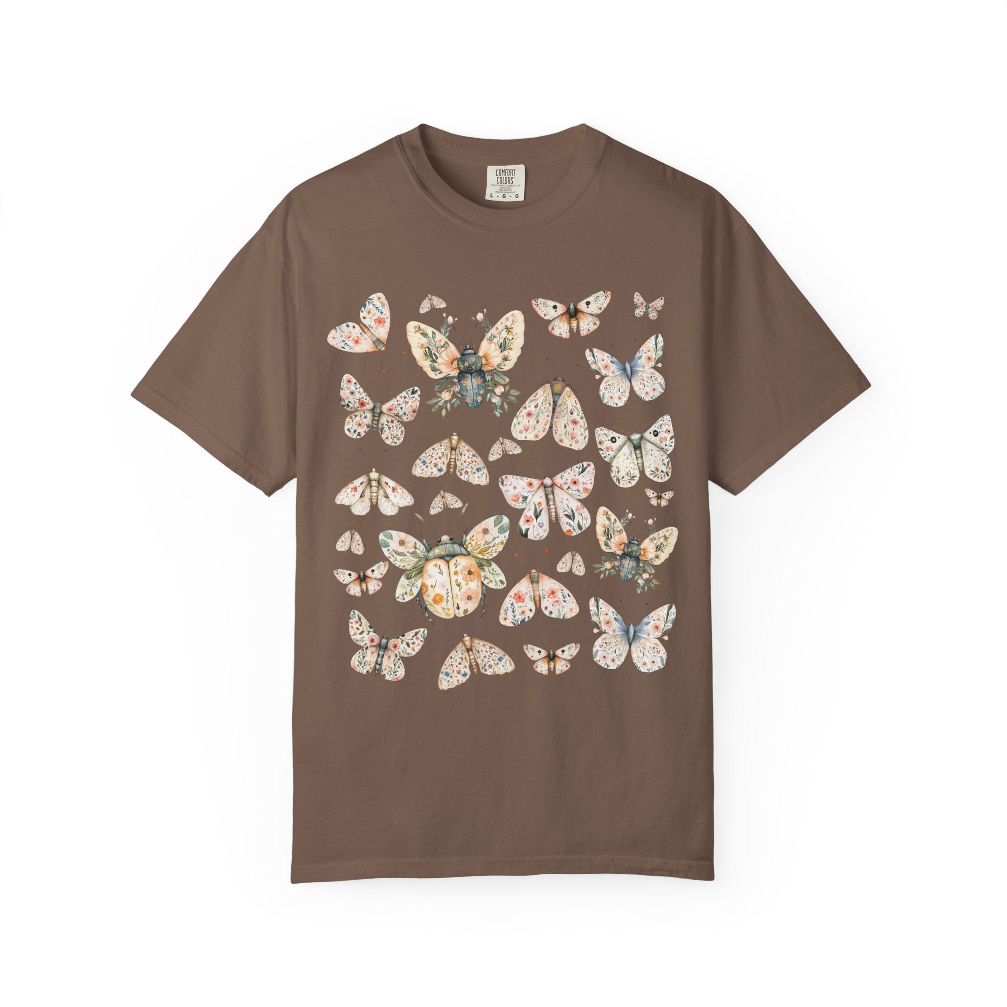 Floral butterfly and moth shirt design featuring pastel wings patterned with flowers, cottagecore nature aesthetic.