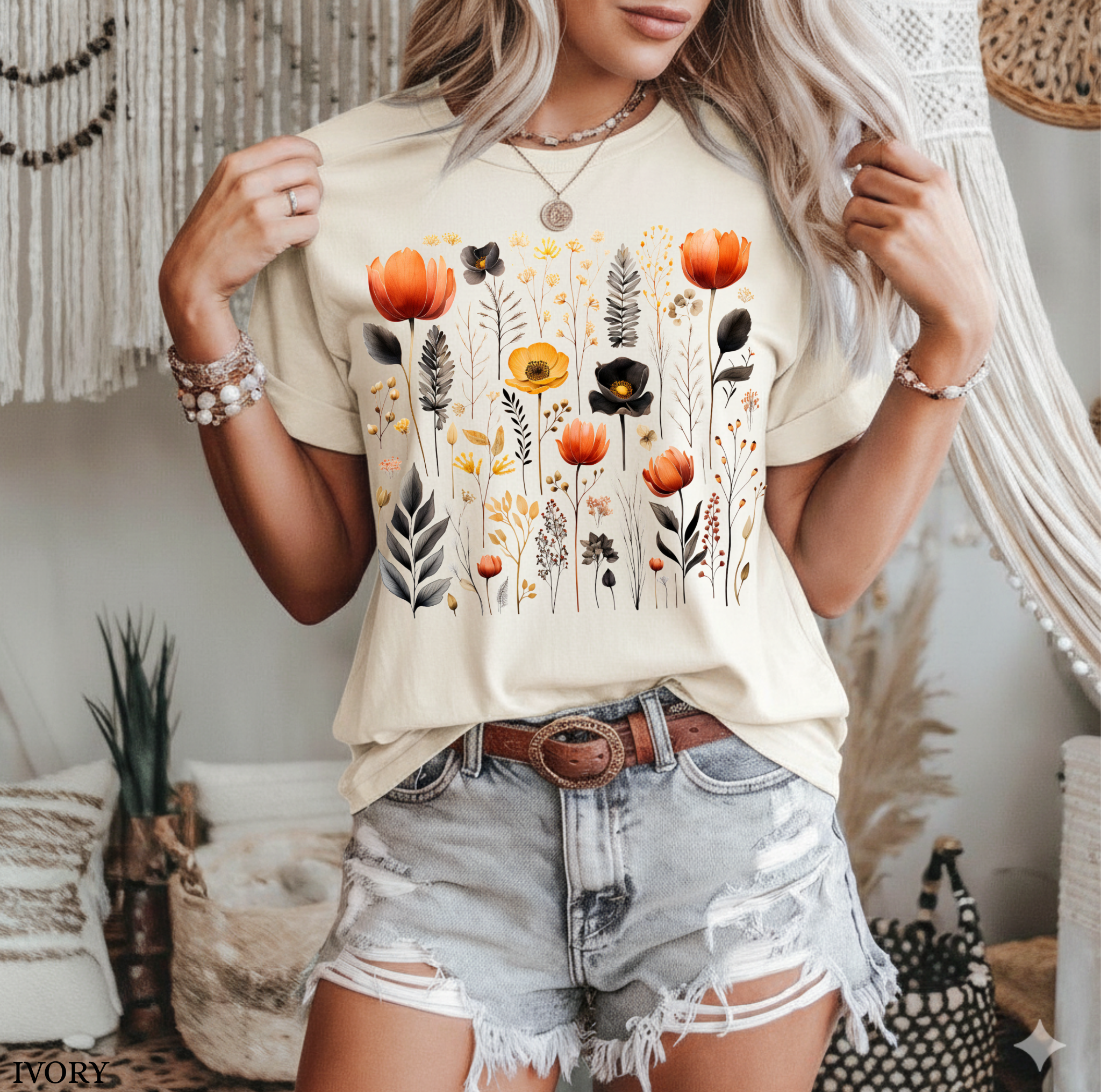 Comfort Colors Pepper shirt featuring a Nordic wildflower botanical design with orange, yellow, and charcoal florals in a cottagecore style