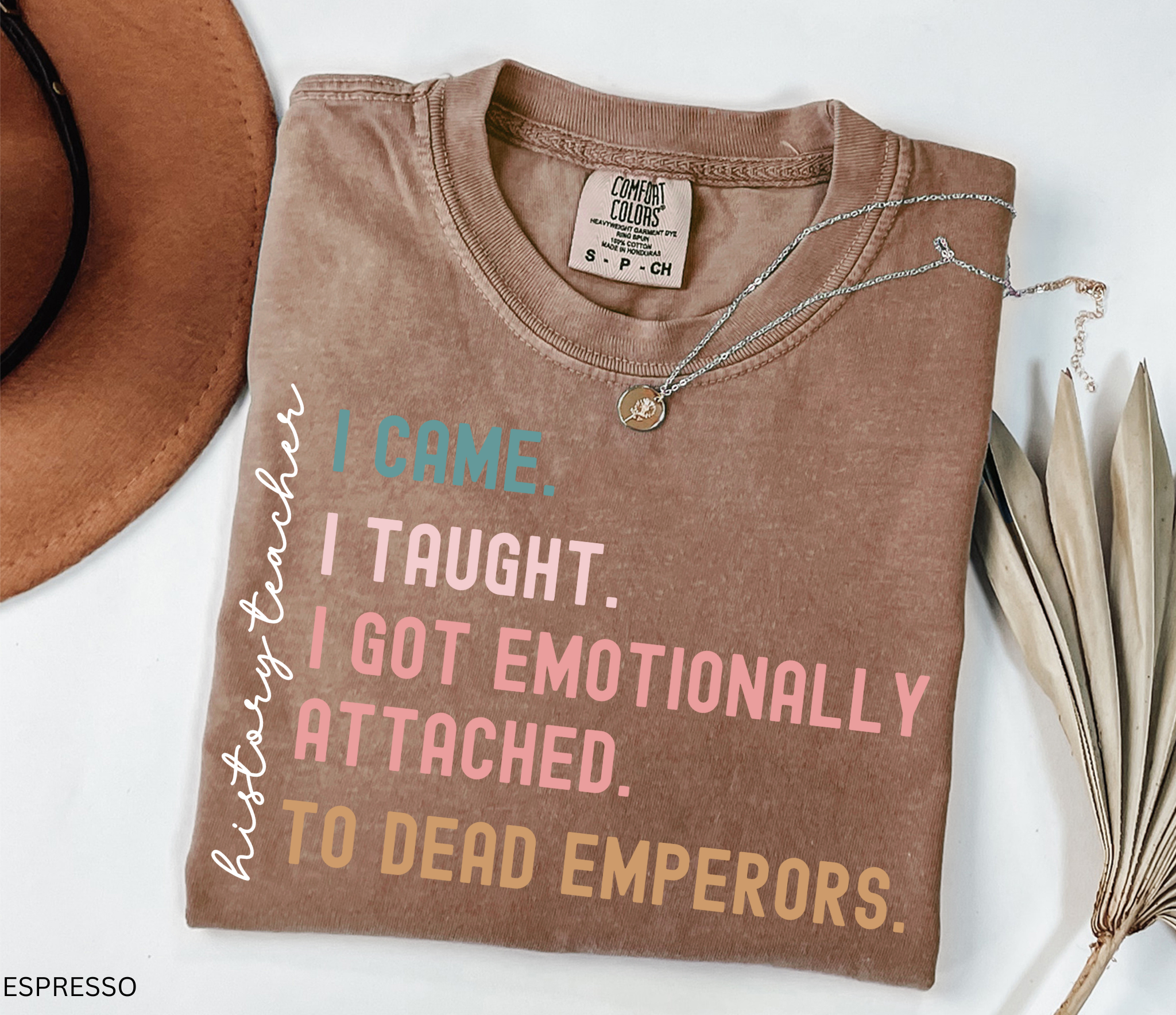 Funny history teacher shirt with the quote ‘I came, I taught, I got emotionally attached to dead emperors.’ Humorous social studies teacher tee.