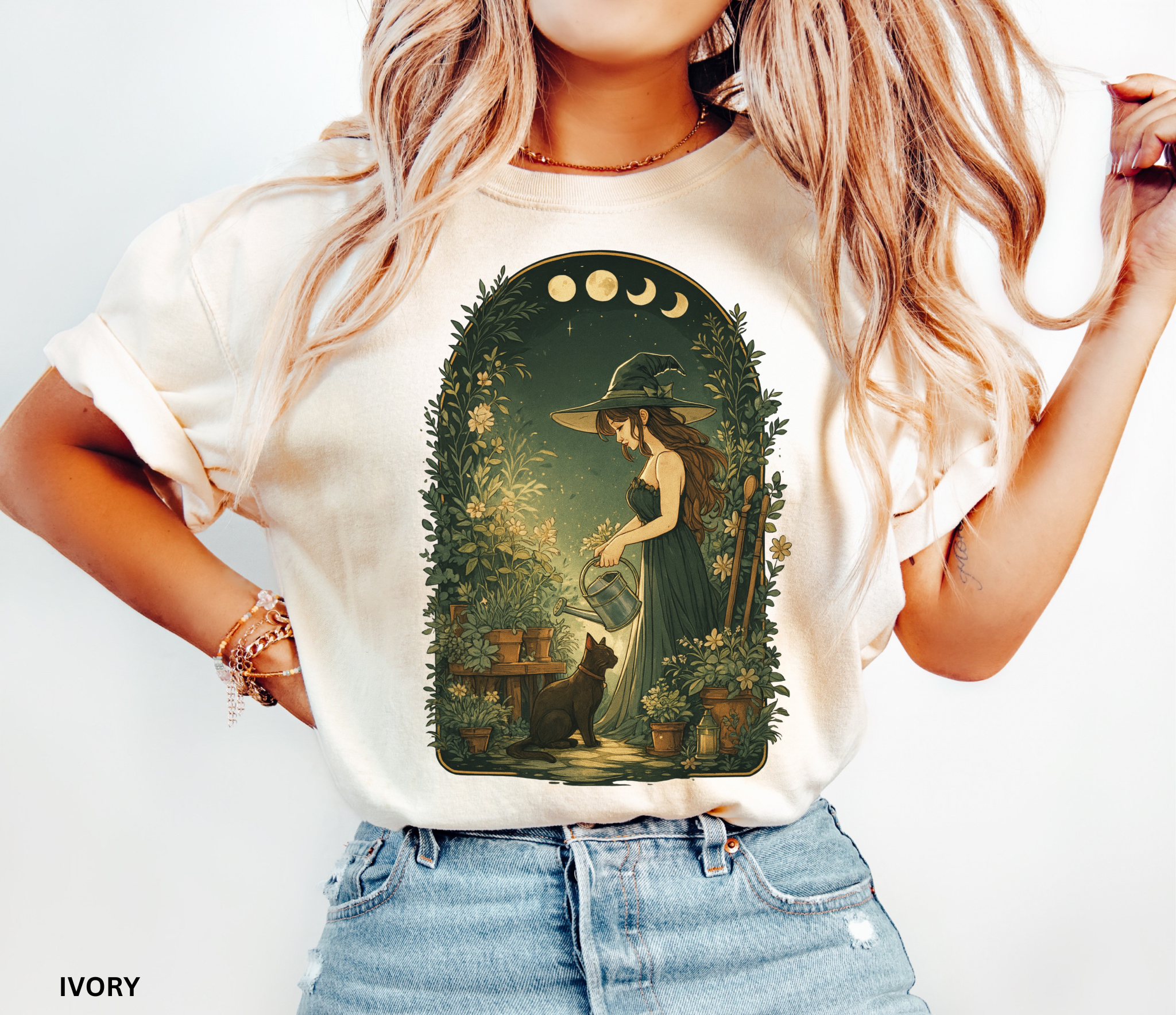 Cottagecore illustration of a garden witch in a green dress watering plants under moon phases, surrounded by foliage and flowers with a black cat by her side.