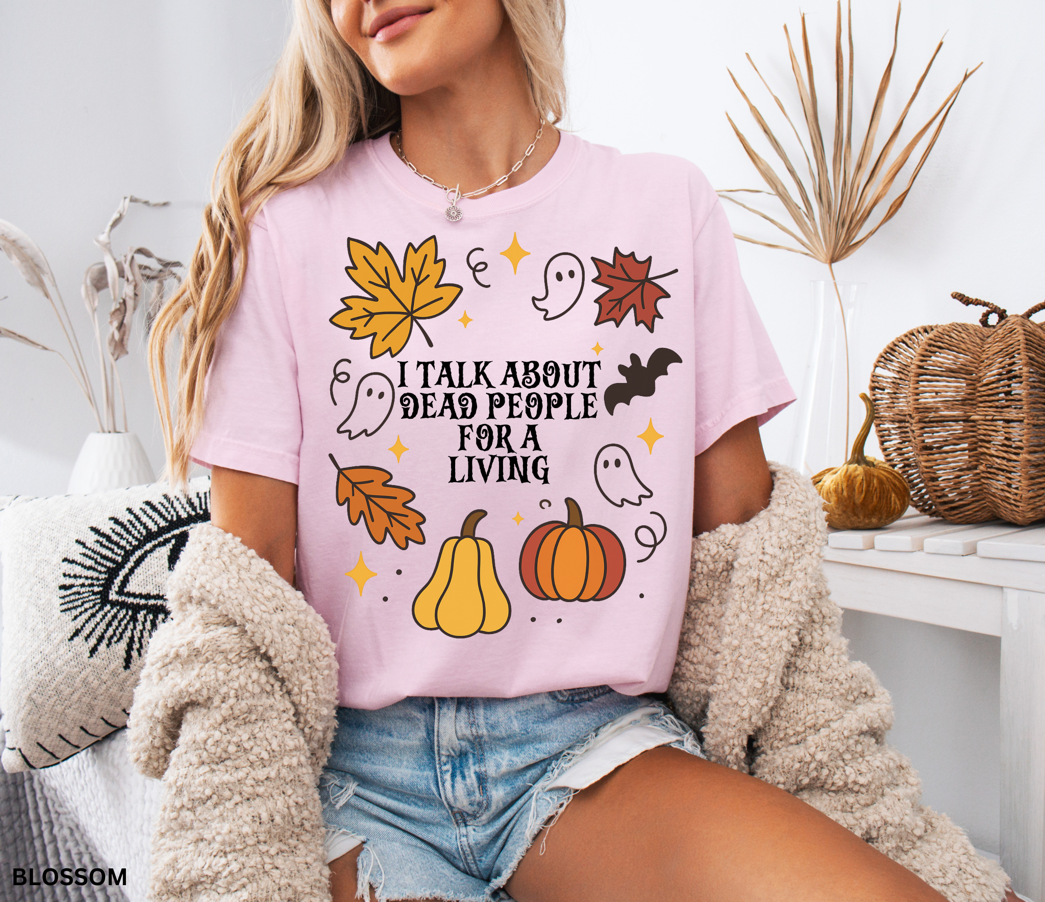 Halloween fall shirt with pumpkins, ghosts, bats, and autumn leaves in a festive design. Cute spooky season tee for fall and Halloween lovers