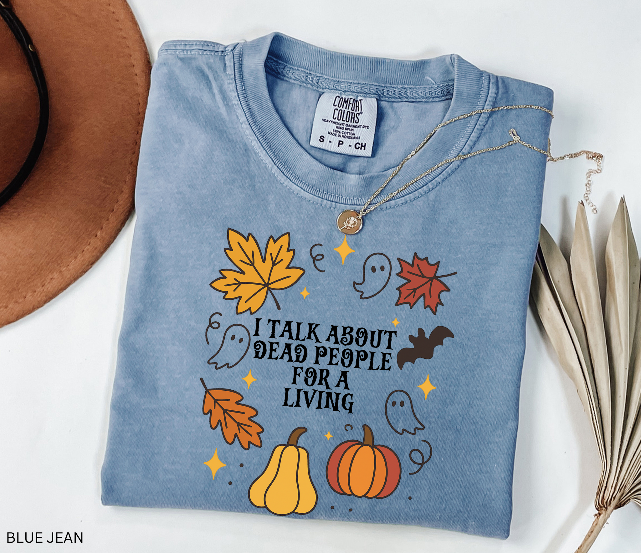 Halloween fall shirt with pumpkins, ghosts, bats, and autumn leaves in a festive design. Cute spooky season tee for fall and Halloween lovers