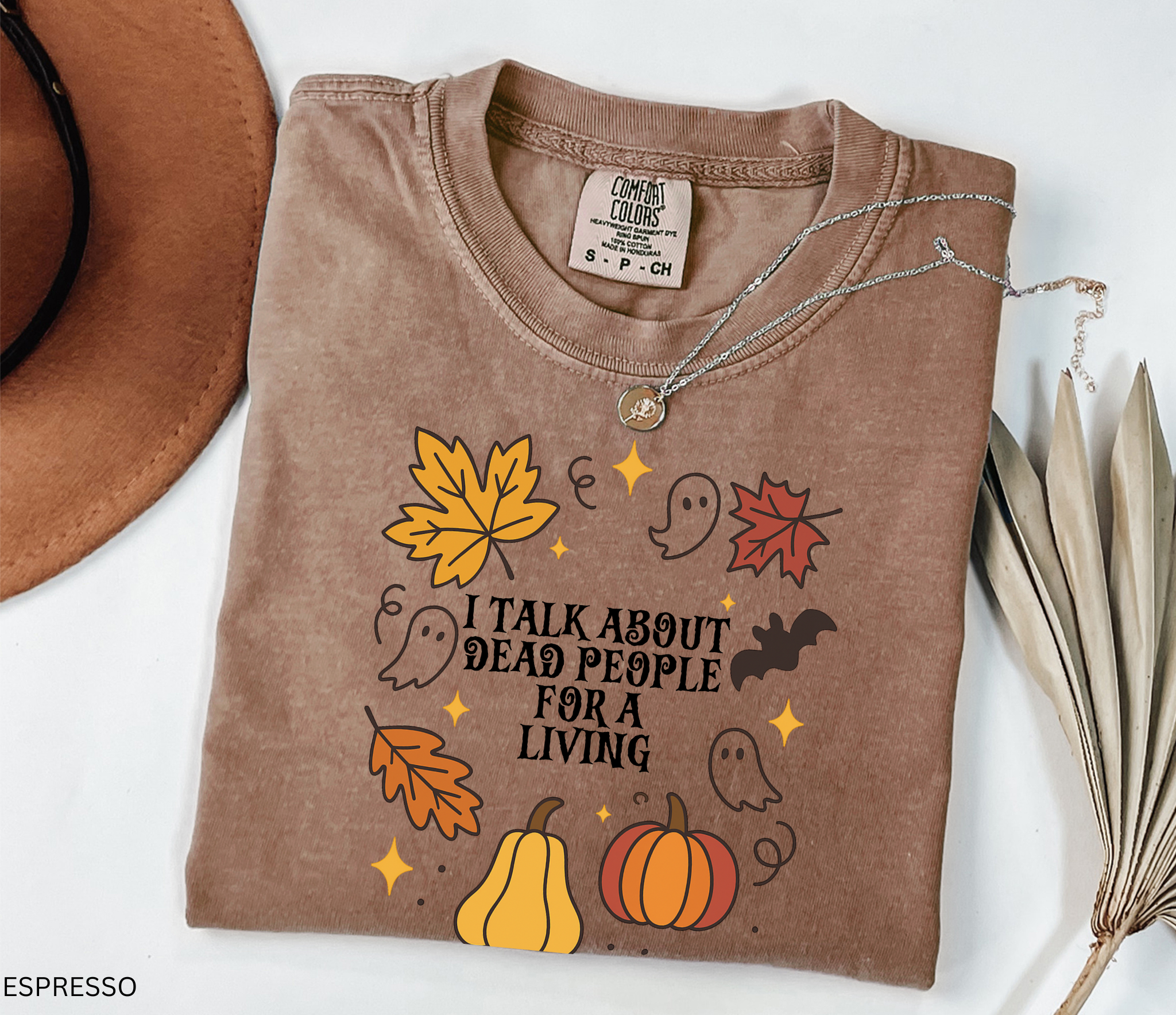 Halloween fall shirt with pumpkins, ghosts, bats, and autumn leaves in a festive design. Cute spooky season tee for fall and Halloween lovers