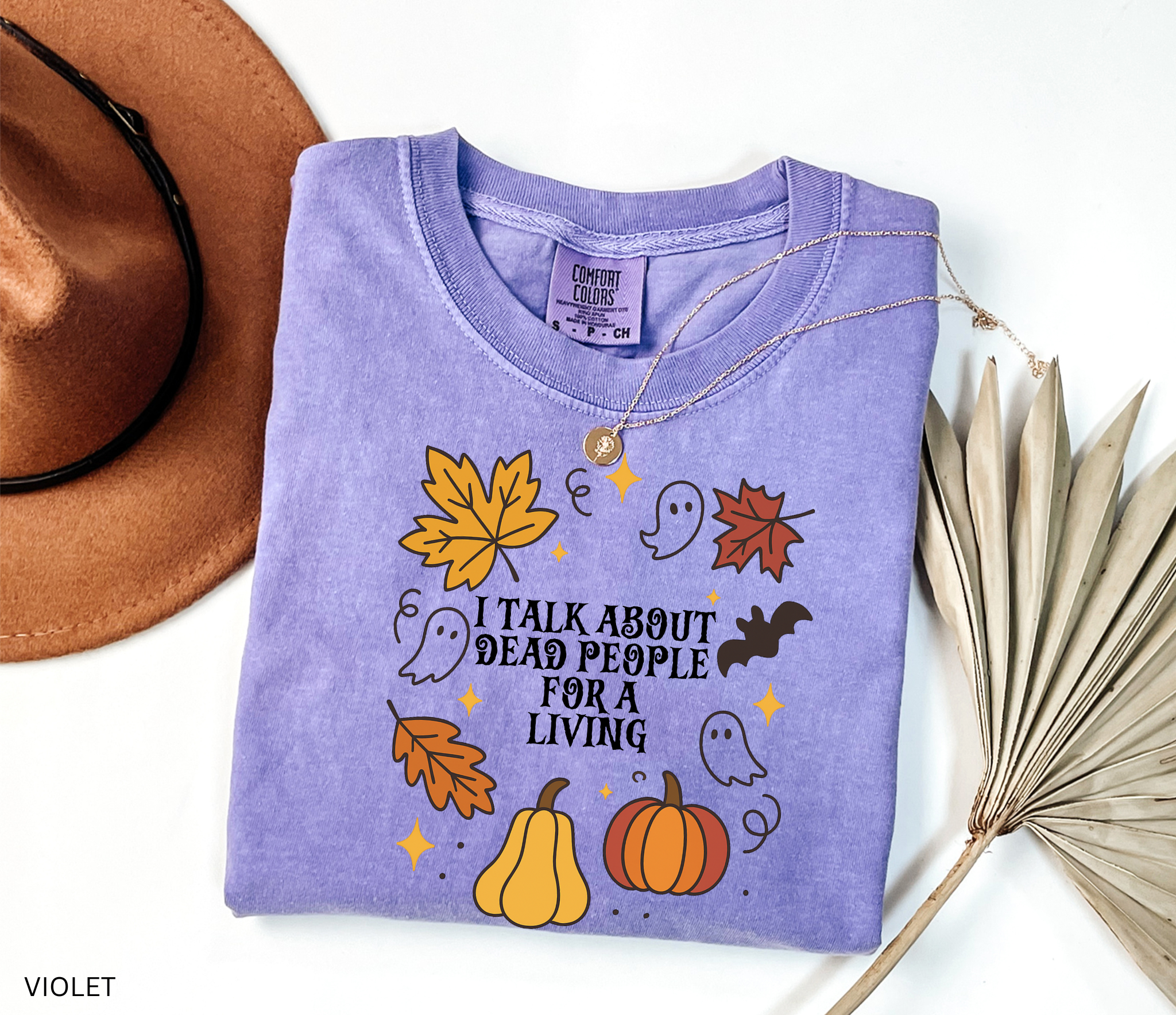 Halloween fall shirt with pumpkins, ghosts, bats, and autumn leaves in a festive design. Cute spooky season tee for fall and Halloween lovers