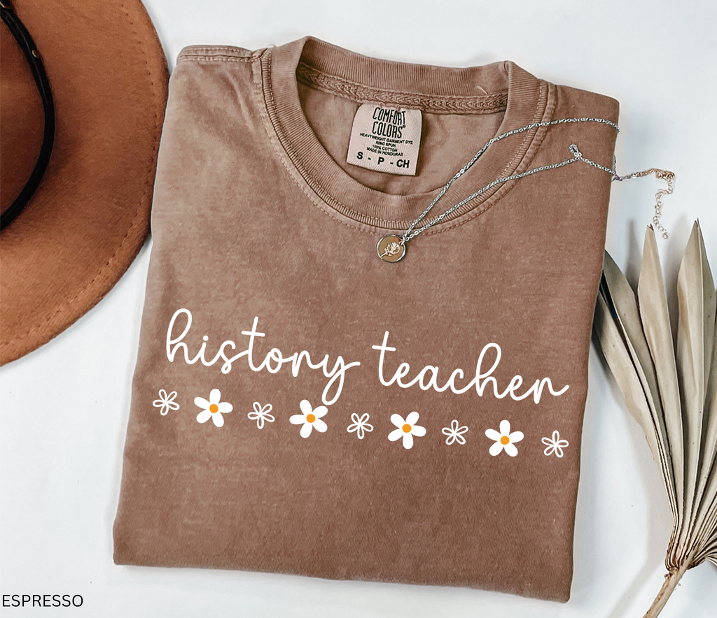 History teacher shirt with cursive text and daisy flower accents. Minimalist cute social studies teacher tee, perfect for classroom or teacher gift