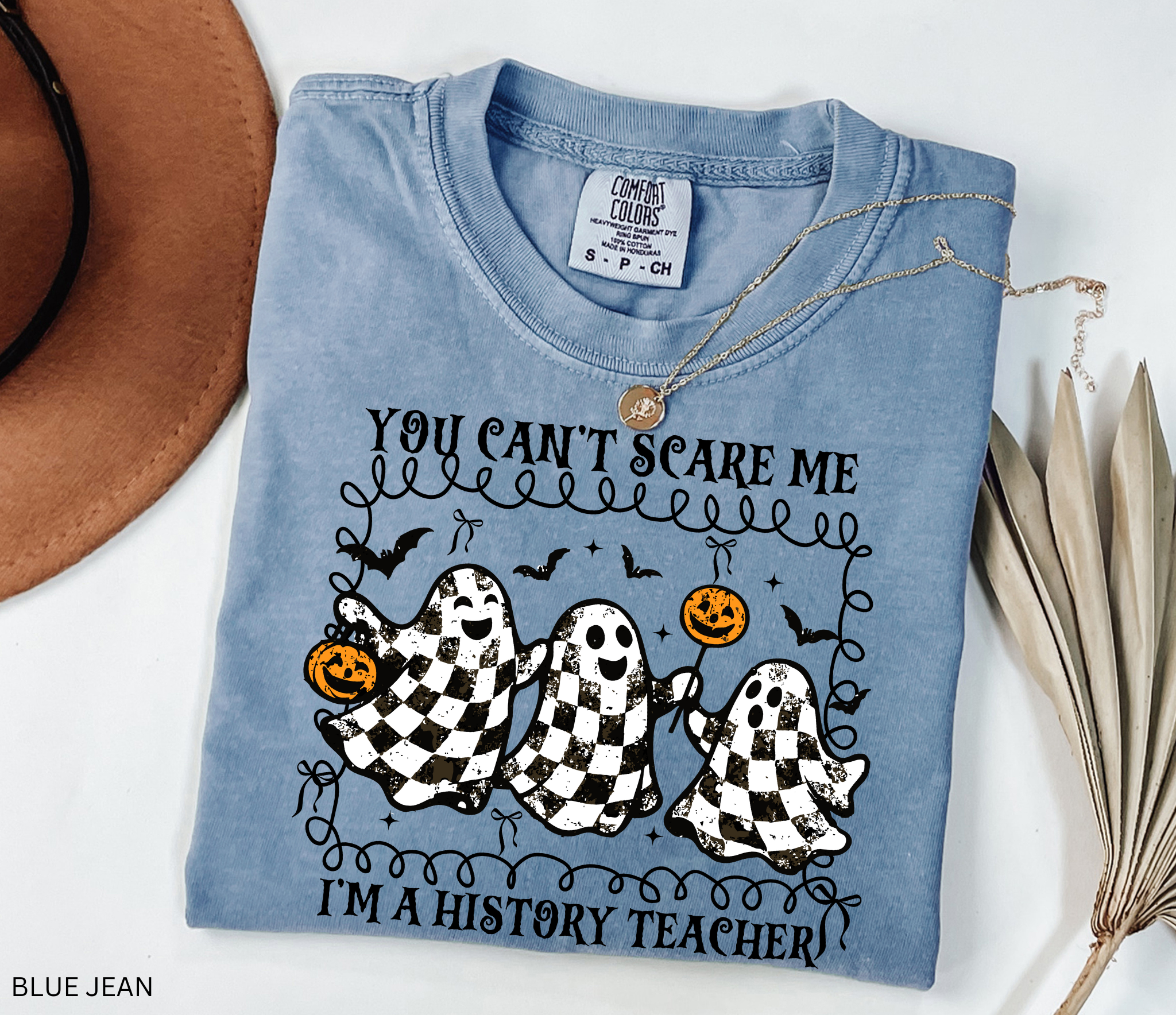 Halloween history teacher shirt with three distressed checkered ghosts holding pumpkins, surrounded by bats. Funny spooky social studies teacher tee.