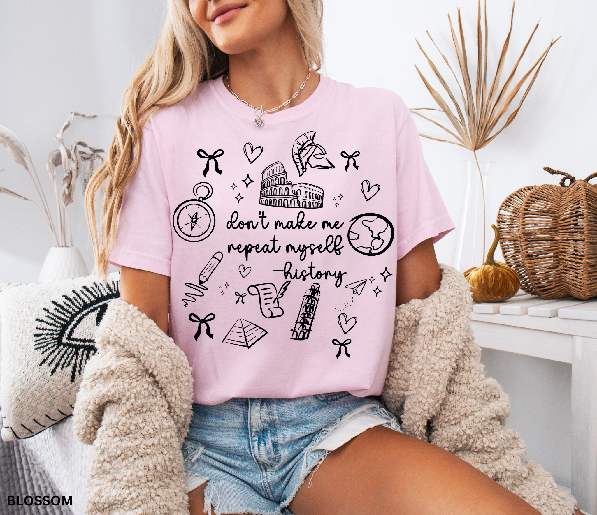 White graphic design of “Don’t Make Me Repeat Myself – History” with doodles of the Colosseum, compass, globe, pyramid, and paper scroll.