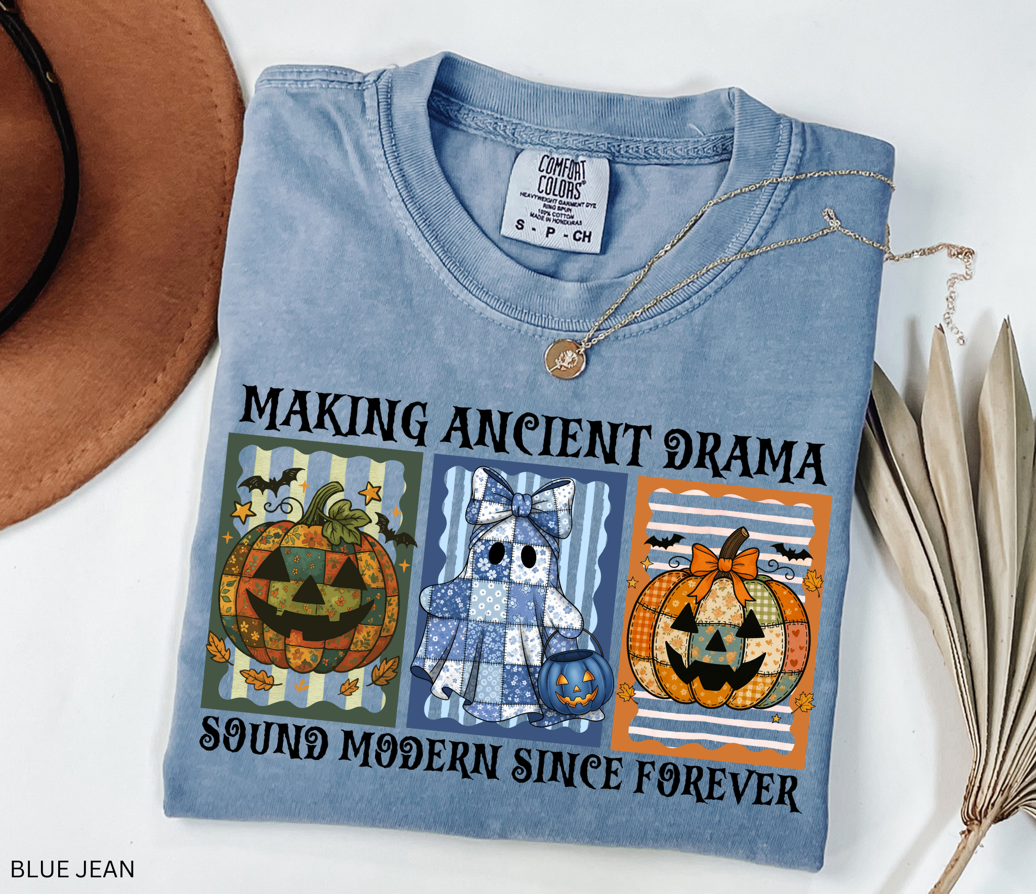 Halloween shirt for history teachers, social studies teachers, and professors with vintage patchwork pumpkins and ghost design, striped backgrounds, and the phrase “Making Ancient Drama Sound Modern Since Forever.”