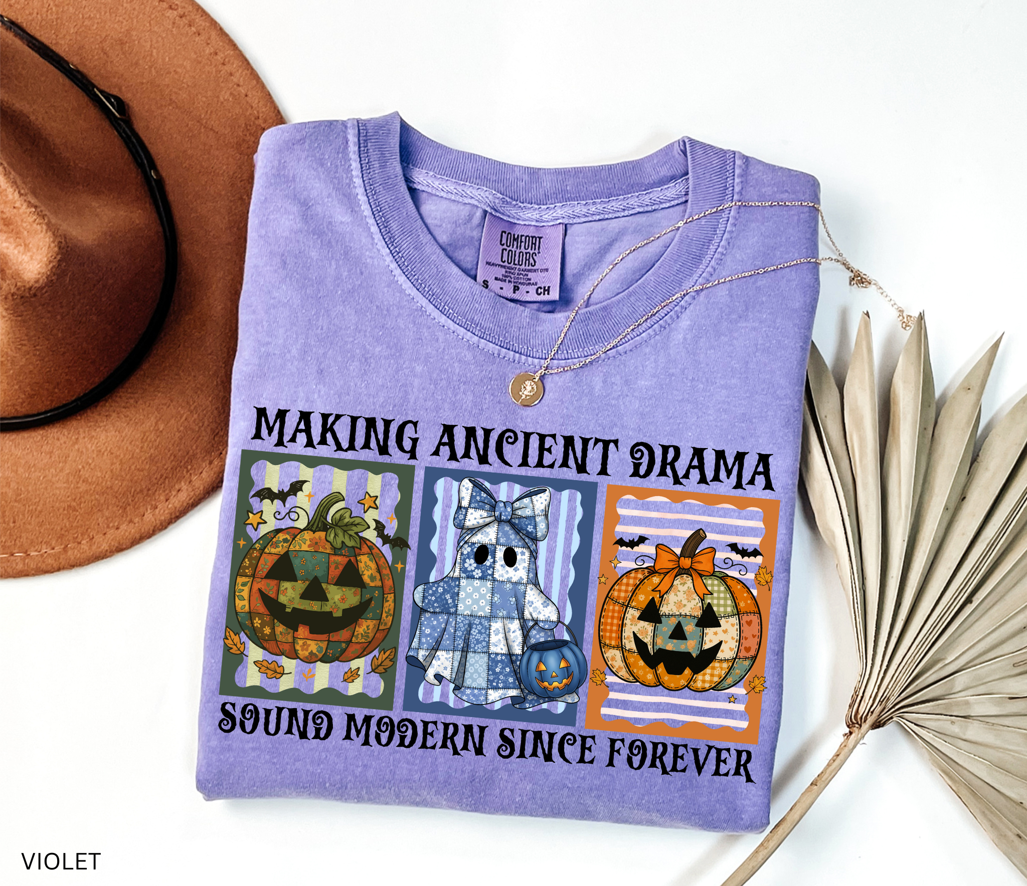 Halloween shirt for history teachers, social studies teachers, and professors with vintage patchwork pumpkins and ghost design, striped backgrounds, and the phrase “Making Ancient Drama Sound Modern Since Forever.”