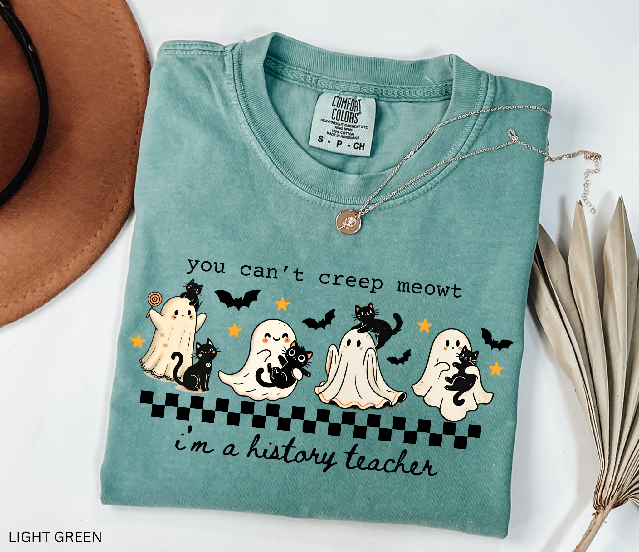 Cute Halloween shirt featuring ghosts with black cats and stars, designed for history teachers and professors.