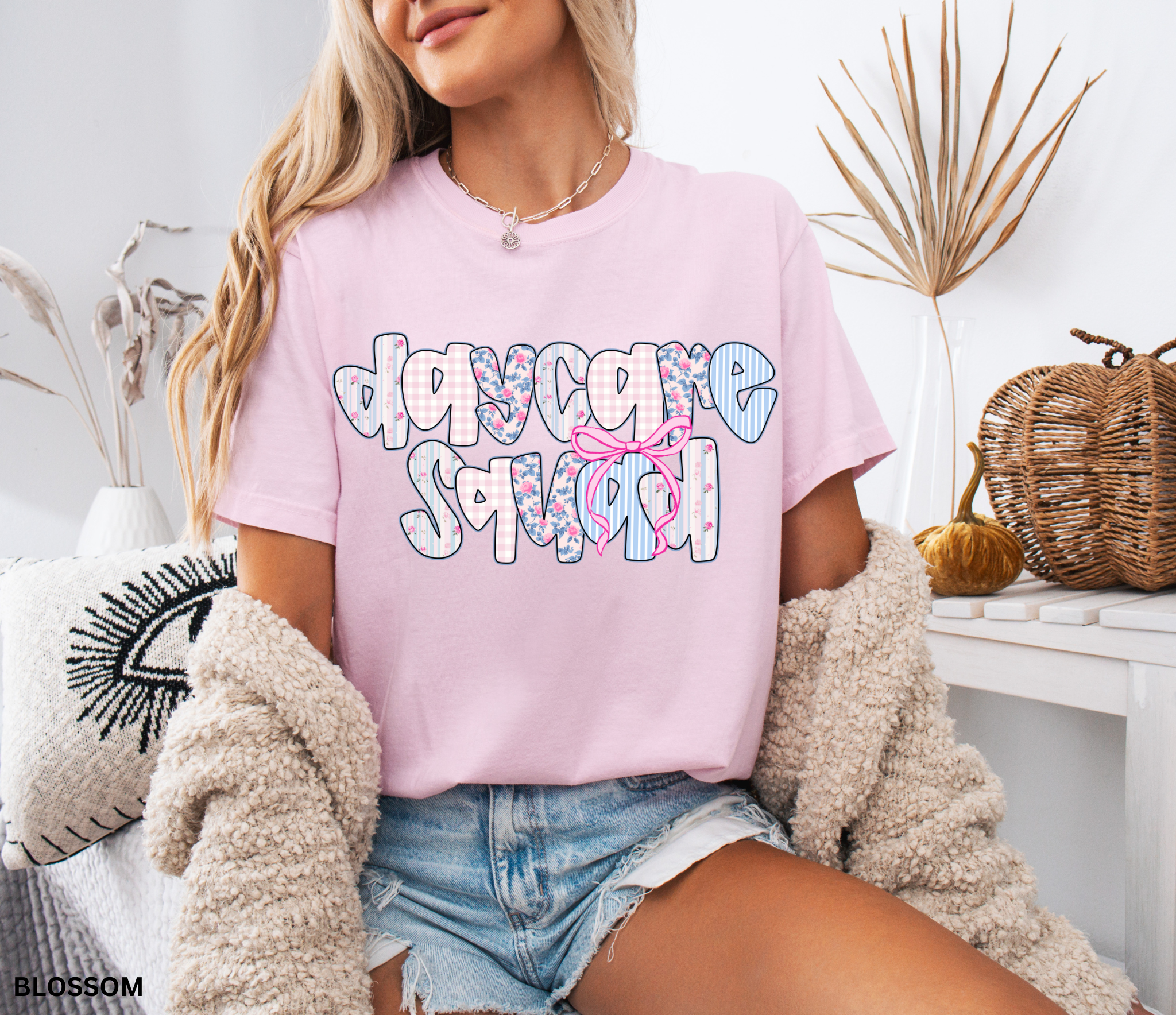 Daycare Squad shirt with floral patterns and pink bow design – teacher team apparel