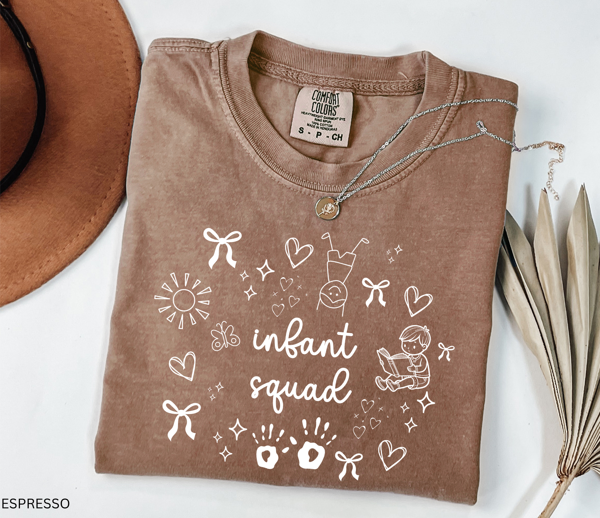 White doodle-style design with bows, hearts, stars, sunshine, baby handprints, a reading child, and the words “Infant Squad.”