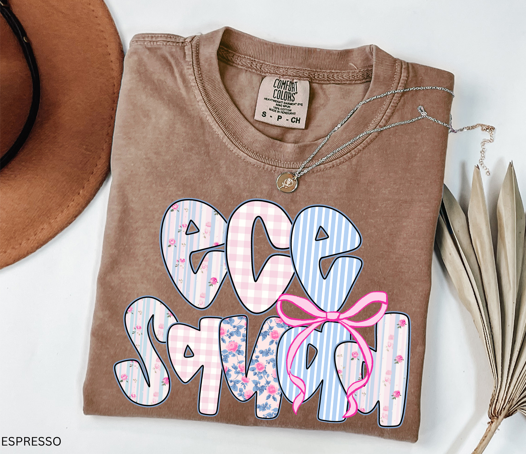 Bold “ECE Squad” text with floral, gingham, and striped patterns, decorated with a pink bow.