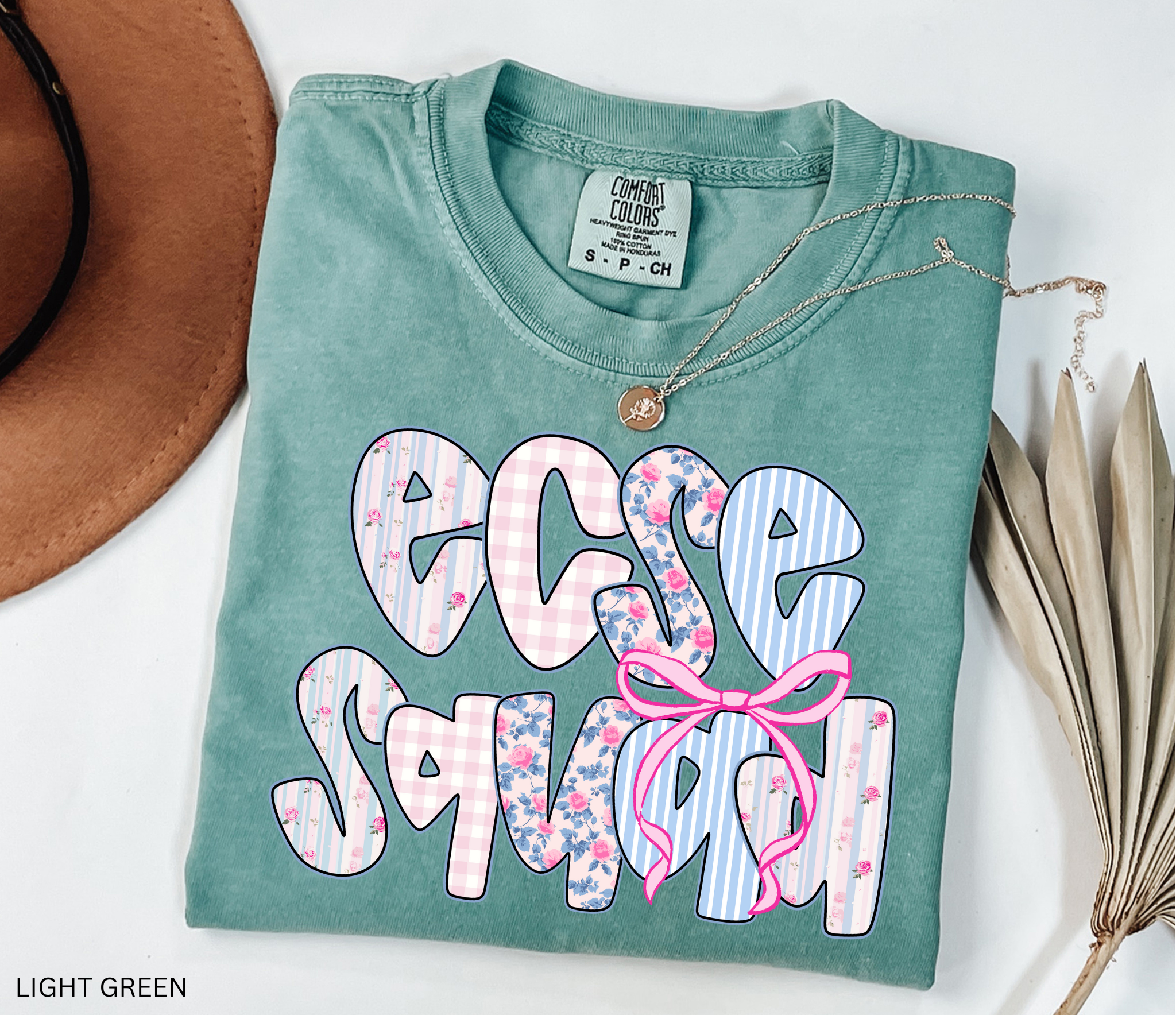 “ECSE Squad” text in floral, gingham, and striped patchwork patterns with a pink bow accent.