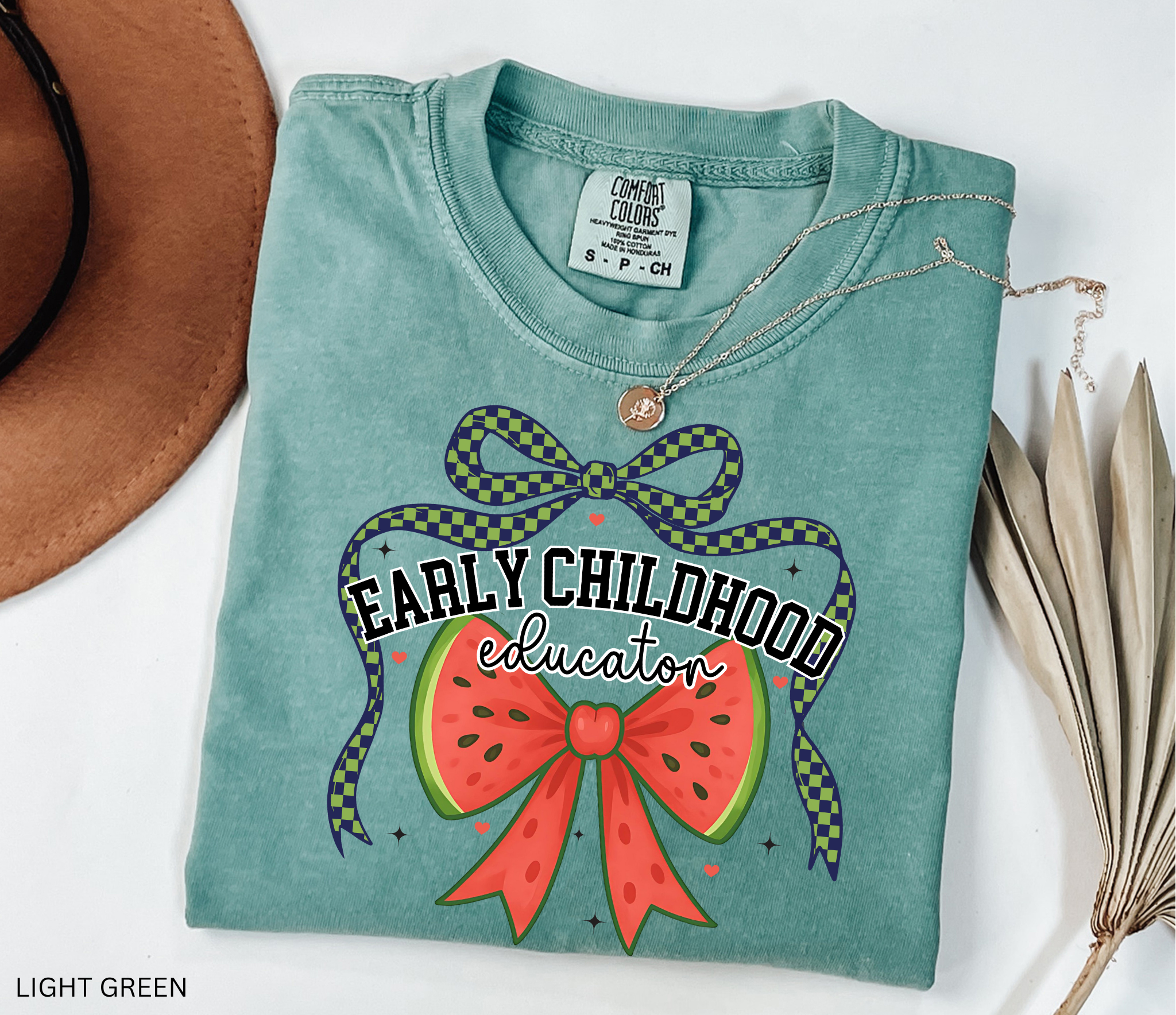 Graphic design with the words “Early Childhood Educator” above a large watermelon bow and checkered green-and-navy ribbon.