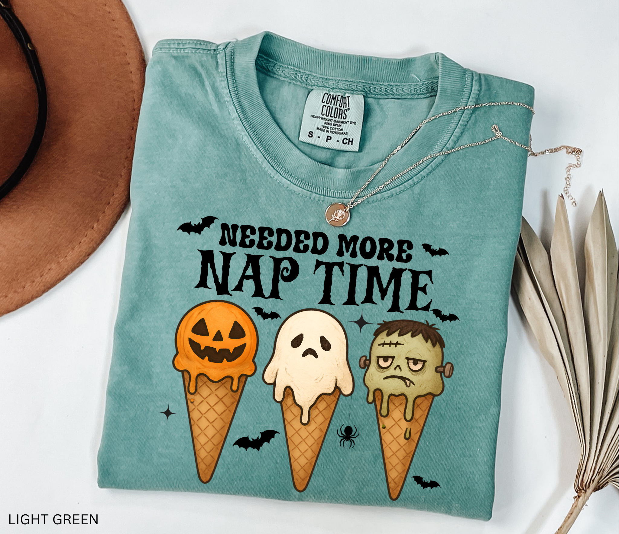 Daycare teacher Halloween shirt with pumpkin, ghost, and Frankenstein ice cream cone design – fun spooky tee for preschool and childcare staff.