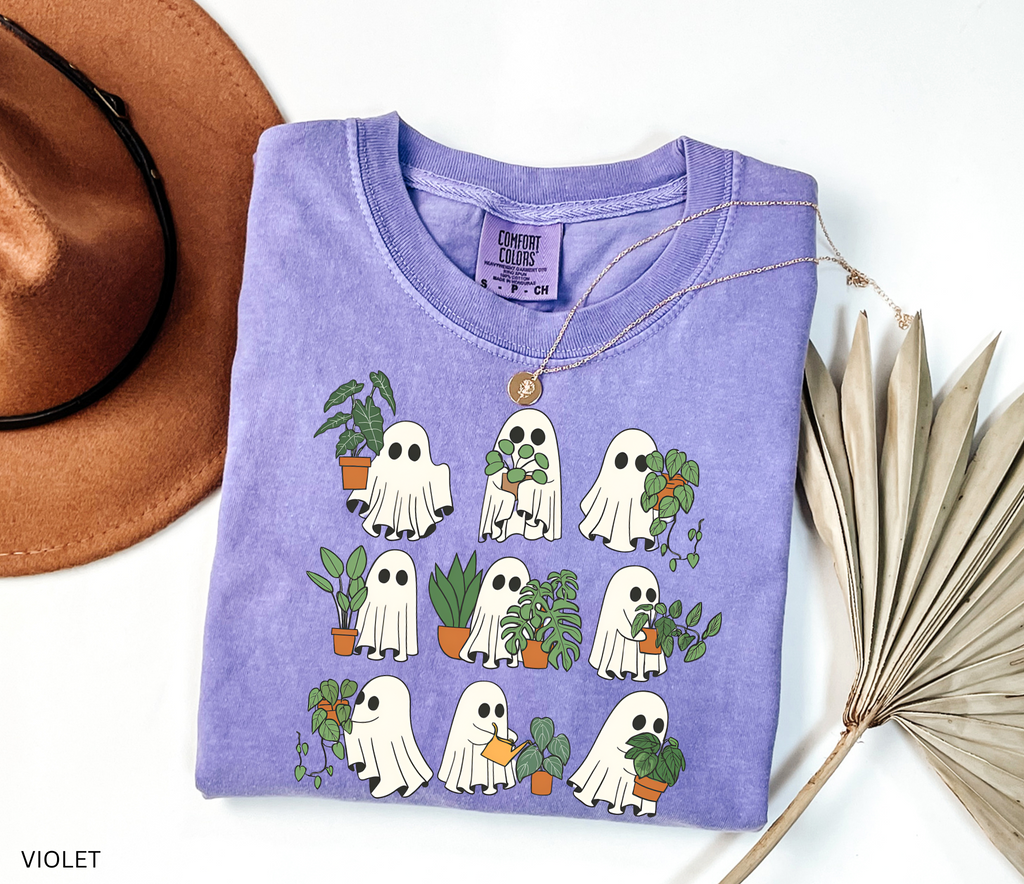 Ghost plant lover shirt with multiple spooky ghosts holding different houseplants on a Comfort Colors tee. Cute Halloween botanical design.