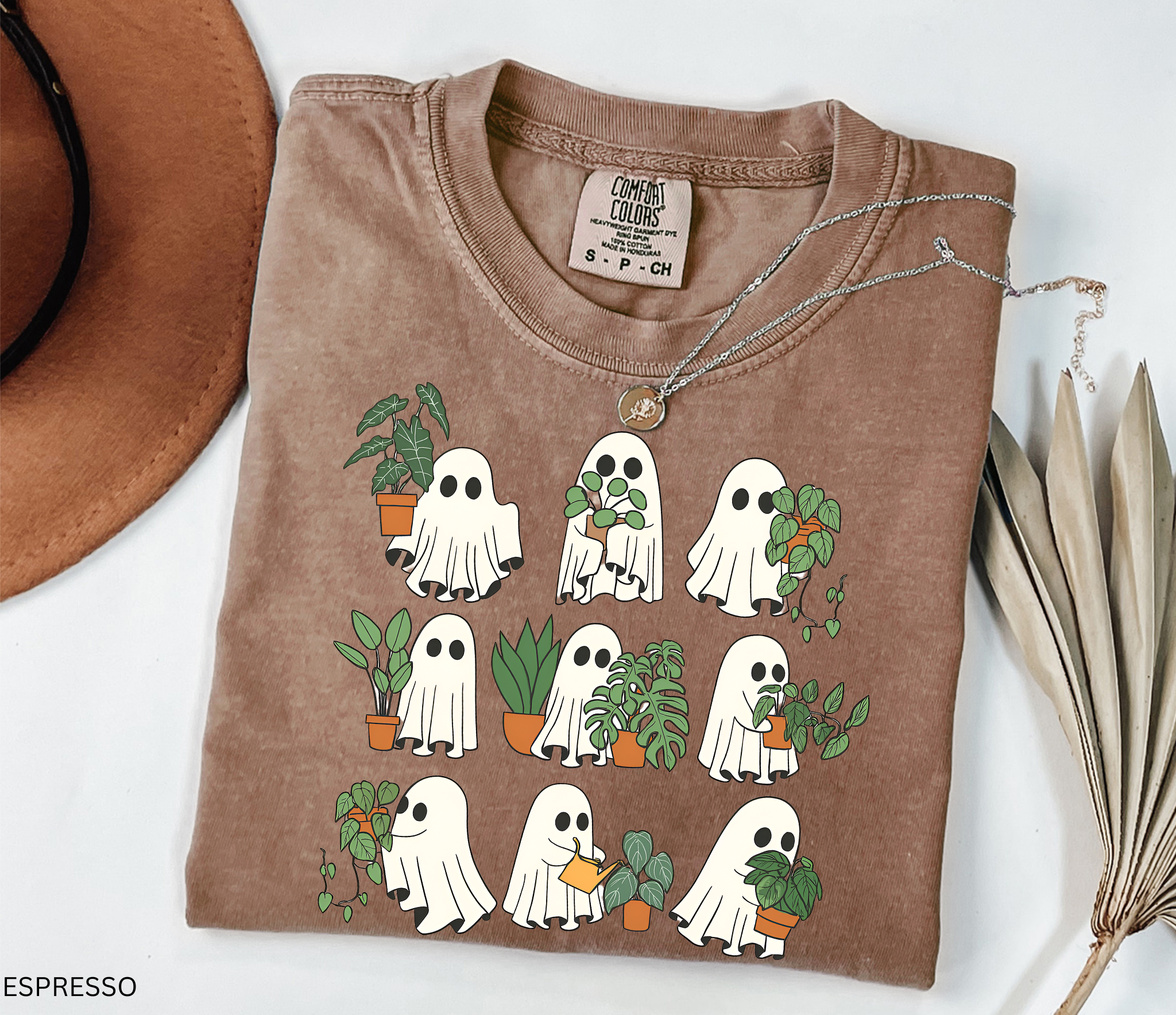 Ghost plant lover shirt with multiple spooky ghosts holding different houseplants on a Comfort Colors tee. Cute Halloween botanical design.