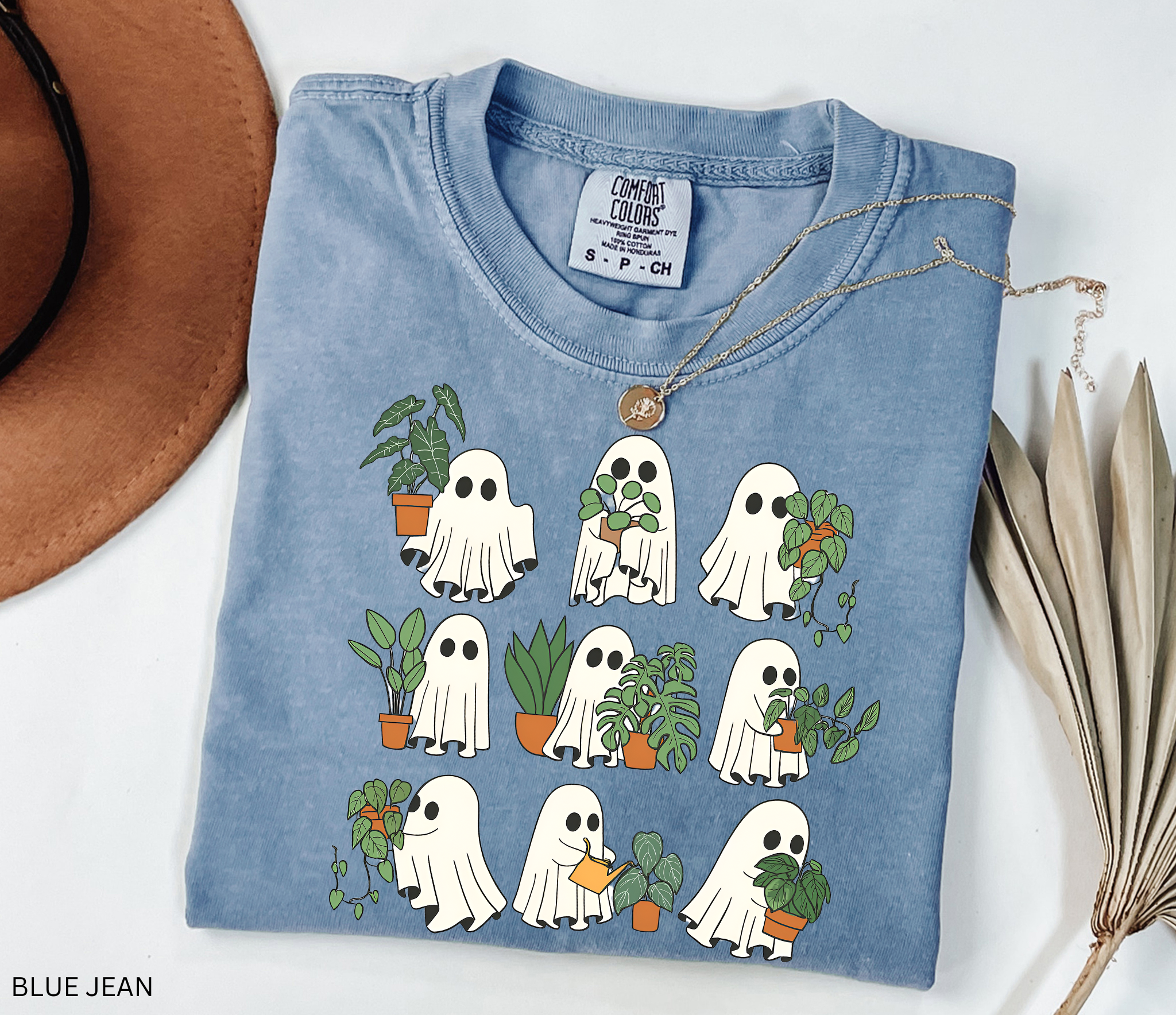 Ghost plant lover shirt with multiple spooky ghosts holding different houseplants on a Comfort Colors tee. Cute Halloween botanical design.
