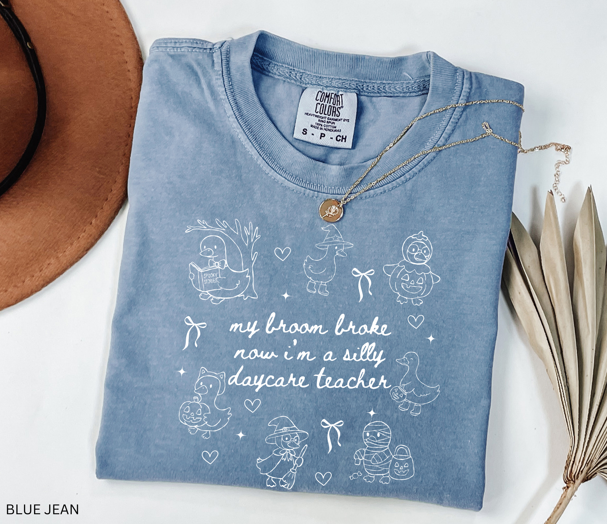 Halloween daycare teacher shirt with geese in witch, pumpkin, and mummy costumes with text saying My Broom Broke, Now I’m a Silly Daycare Teacher.