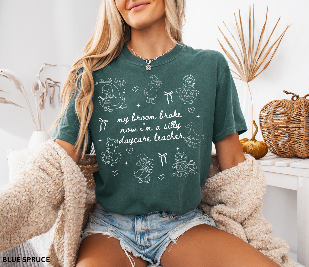 Halloween daycare teacher shirt with geese in witch, pumpkin, and mummy costumes with text saying My Broom Broke, Now I’m a Silly Daycare Teacher.