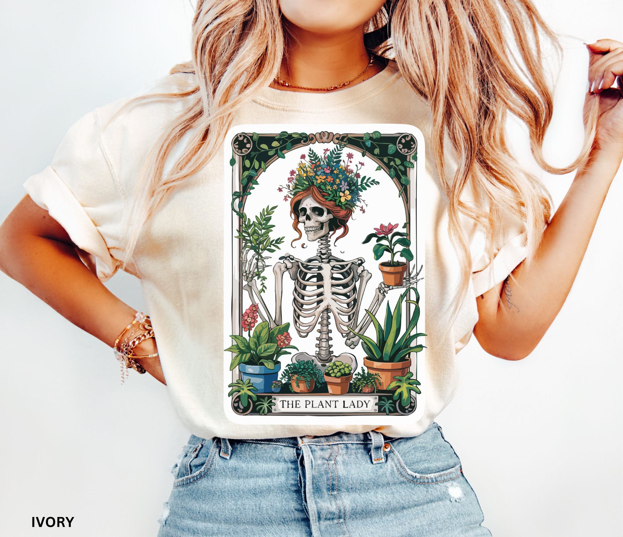 Floral-crowned skeleton holding potted plants, surrounded by greenery — witchy botanical “The Plant Lady” shirt design, cottagecore aesthetic.