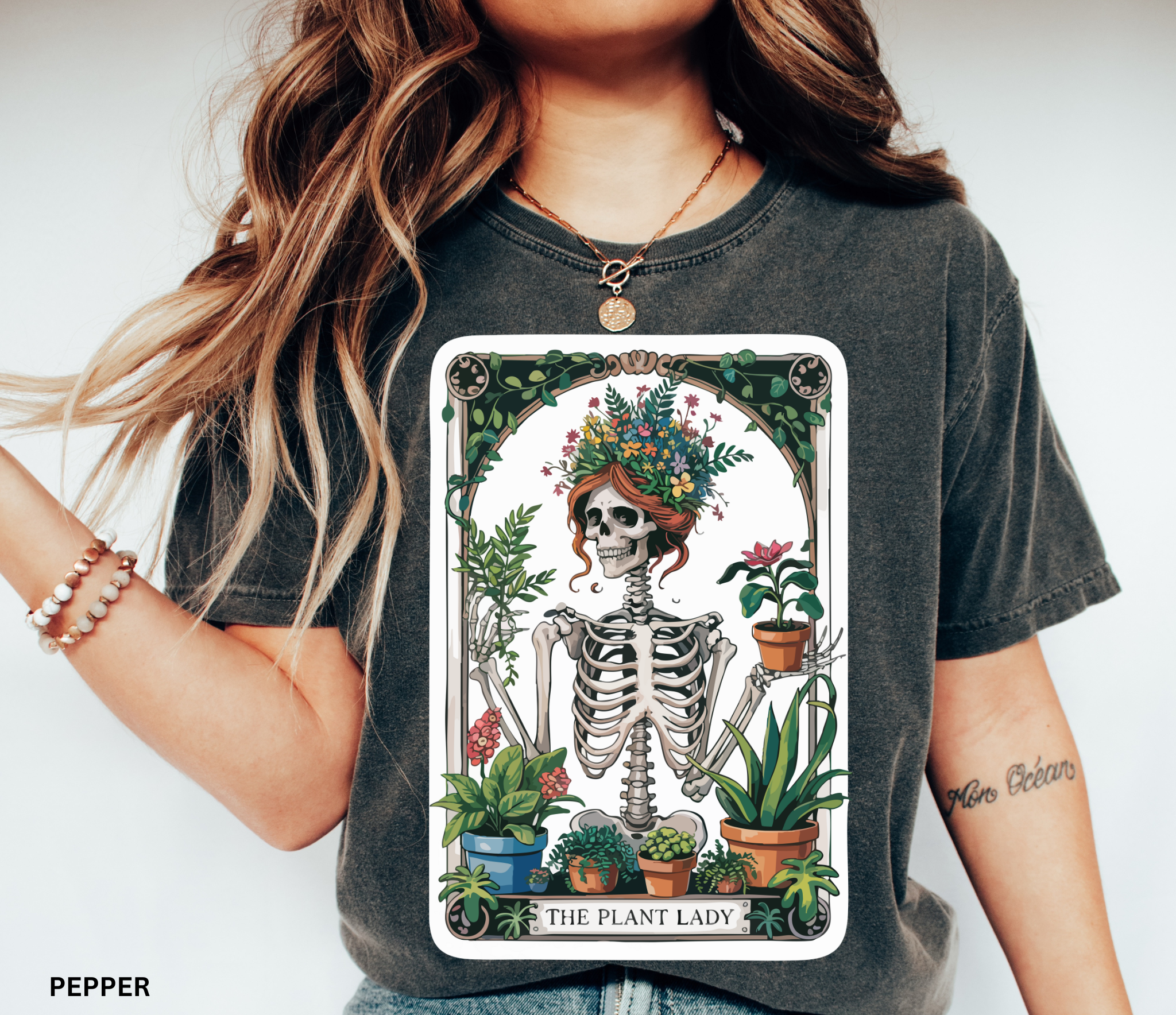 Floral-crowned skeleton holding potted plants, surrounded by greenery — witchy botanical “The Plant Lady” shirt design, cottagecore aesthetic.